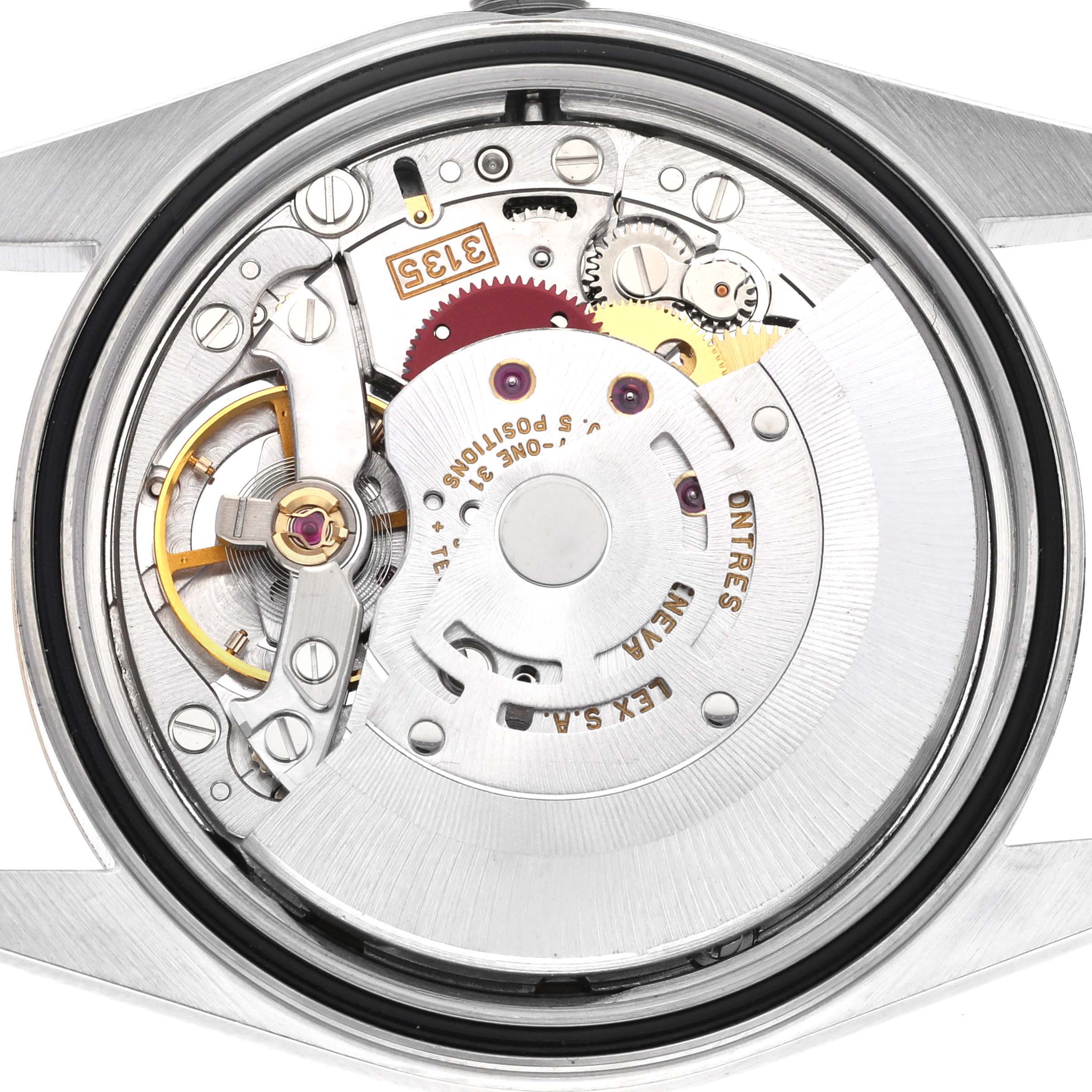 The image shows the movement mechanism of a Rolex Datejust 16233 Men's Steel and Gold (two tone) Champagne Dial 16233 Men's Steel and Gold (two tone) Champagne Dial watch from a top-down angle, highlighting gears and the rotor.