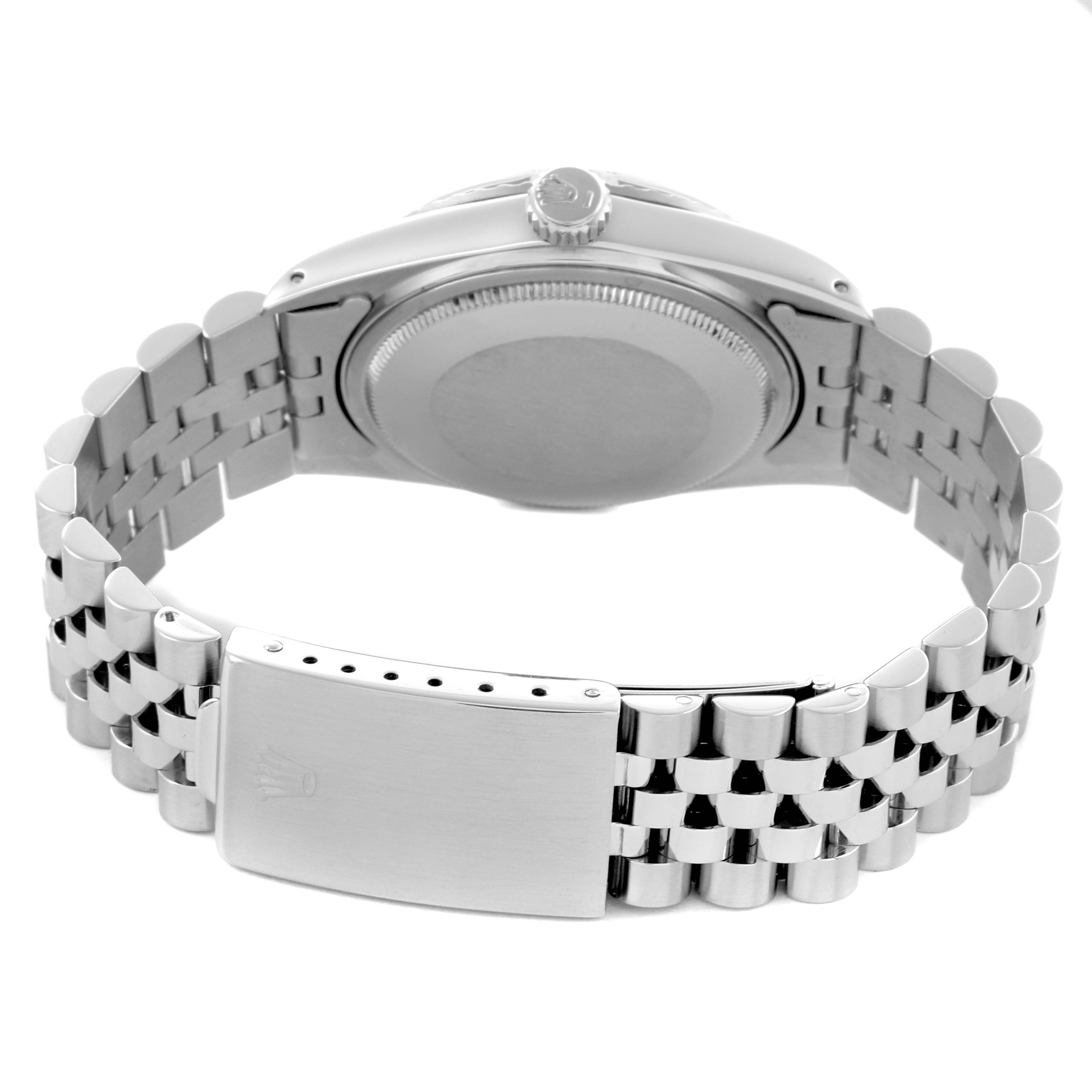 The Rolex Datejust 16030 Men's Stainless Steel Silver Dial 16030 Men's Stainless Steel Silver Dial watch is shown from the back, highlighting the case back, bracelet, and clasp.