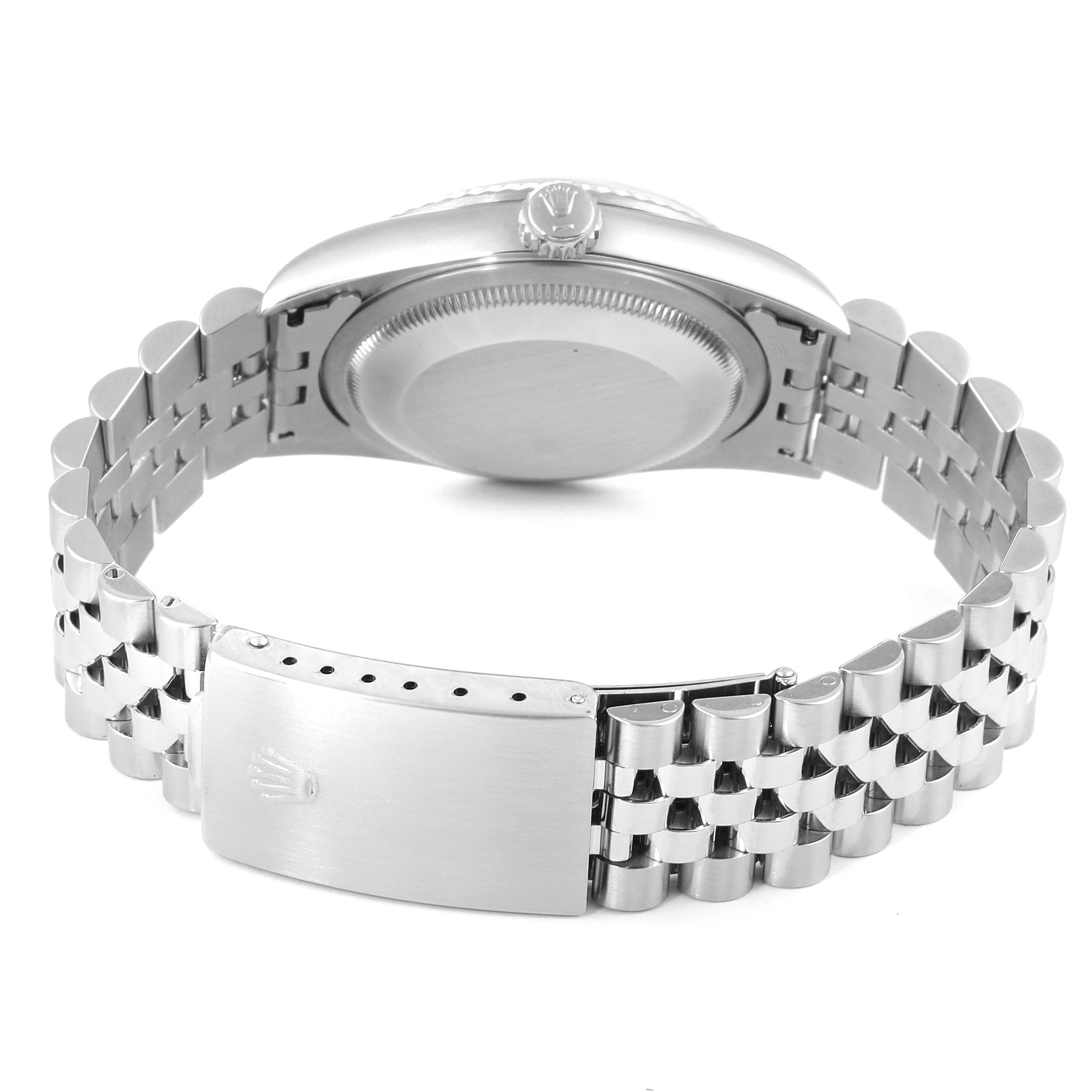 This image shows the back view of a Rolex Datejust 16234 Men's Stainless Steel Silver Dial 16234 Men's Stainless Steel Silver Dial watch, highlighting its case back, crown, and jubilee bracelet.