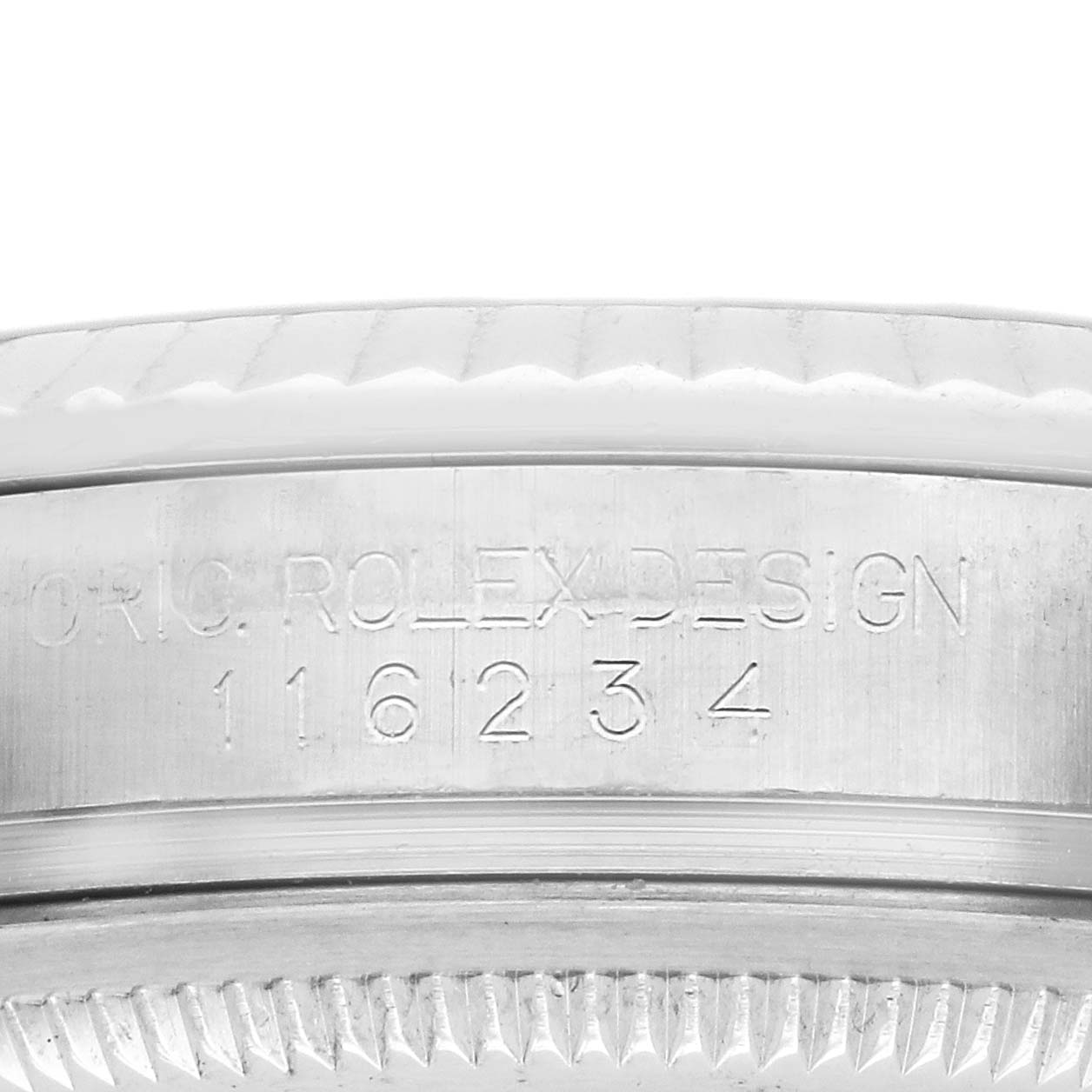 The image shows the side engraving on the bezel of a Rolex Datejust 116234 Men's Stainless Steel Black Dial 116234 Men's Stainless Steel Black Dial watch, highlighting the model number.