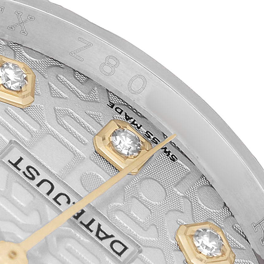 The image shows a close-up of the Rolex Datejust 116233 Men's Steel and Gold (two tone) Silver Dial dial with diamond hour markers, partial bezel, and hands.