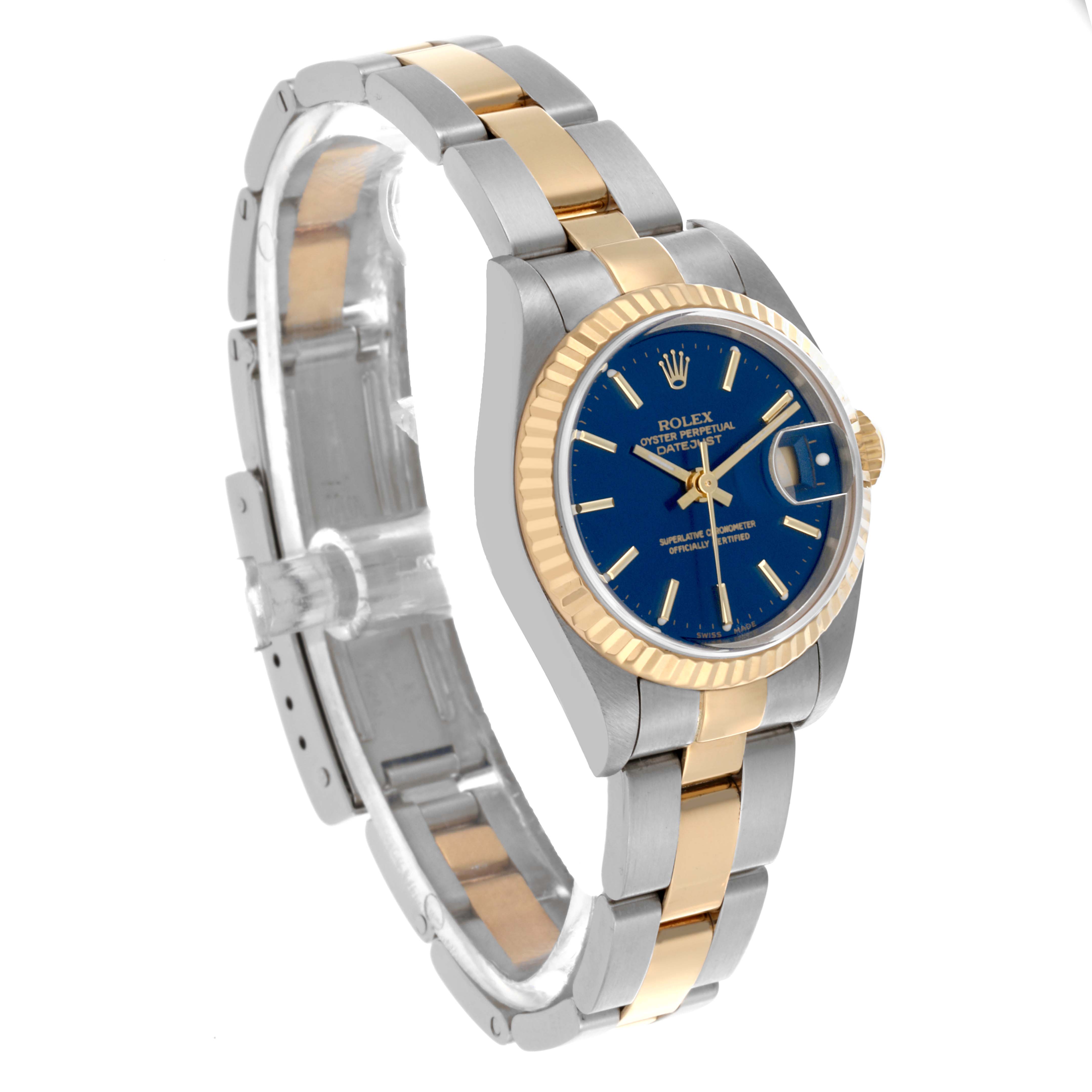 The Rolex Datejust 79173 Women's Steel and Gold (two tone) Blue Dial 79173 Women's Steel and Gold (two tone) Blue Dial watch is shown at a three-quarter angle, highlighting the blue dial, fluted bezel, and two-tone bracelet.
