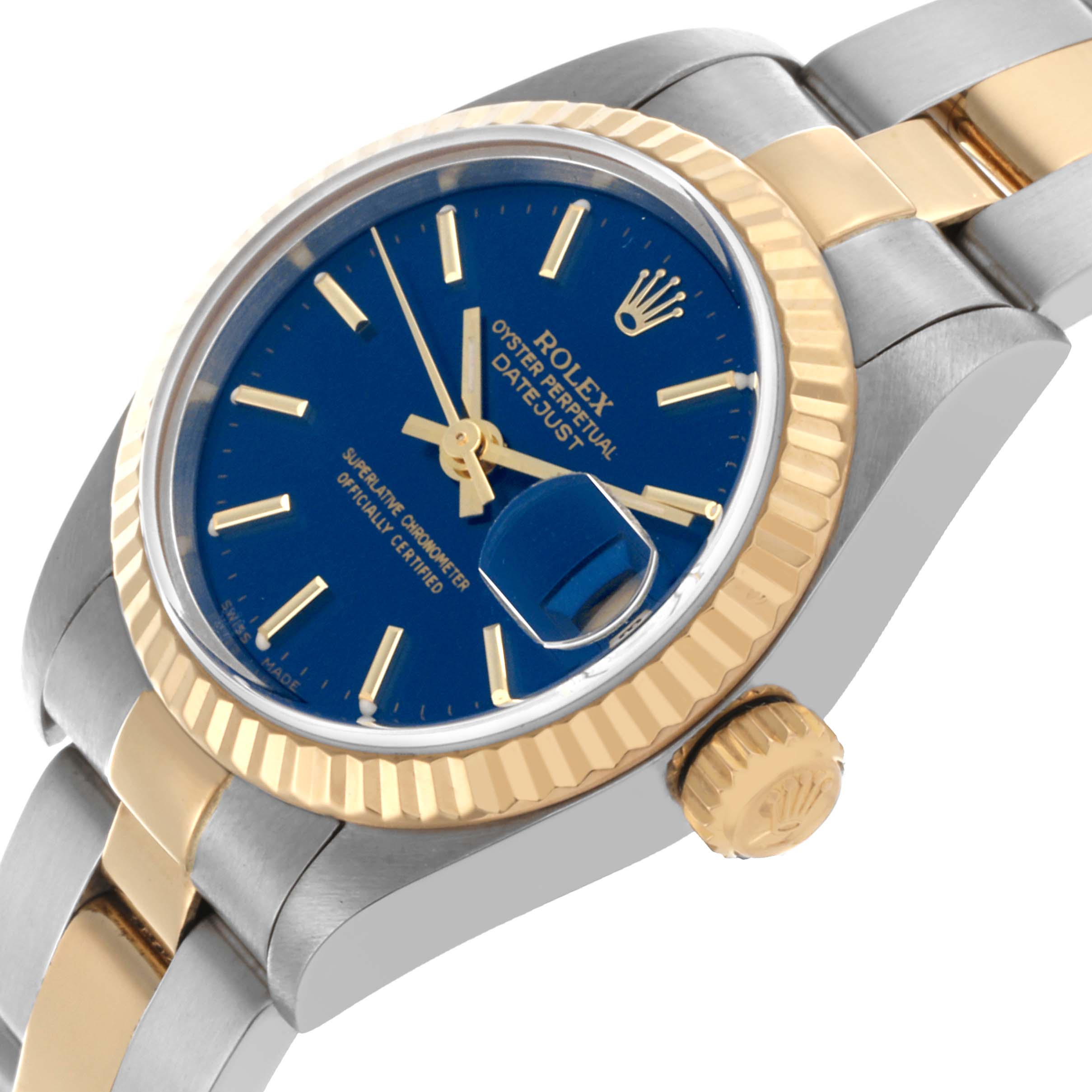The image shows a Rolex Datejust 79173 Women's Steel and Gold (two tone) Blue Dial 79173 Women's Steel and Gold (two tone) Blue Dial watch from a side angle, highlighting its blue dial, fluted bezel, and two-tone bracelet.