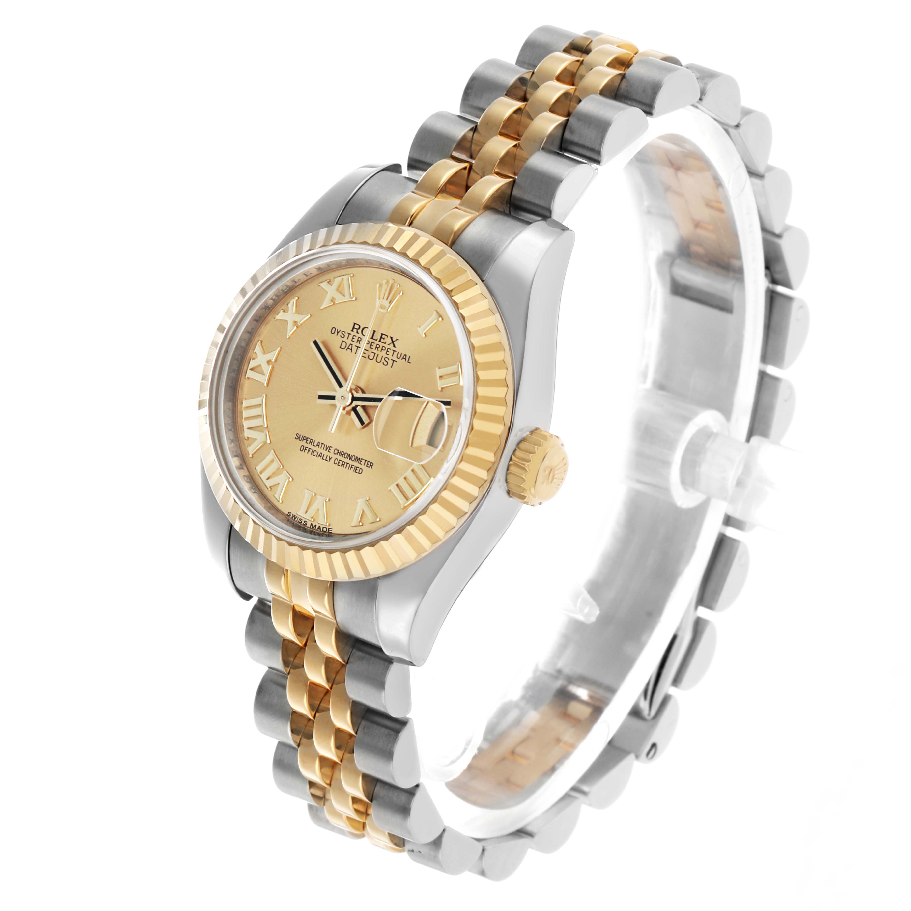 The Rolex Datejust 179173 Women's Steel and Gold (two tone) Champagne Dial watch is shown at a slight angle, displaying its two-tone bracelet, fluted bezel, and date magnifier.
