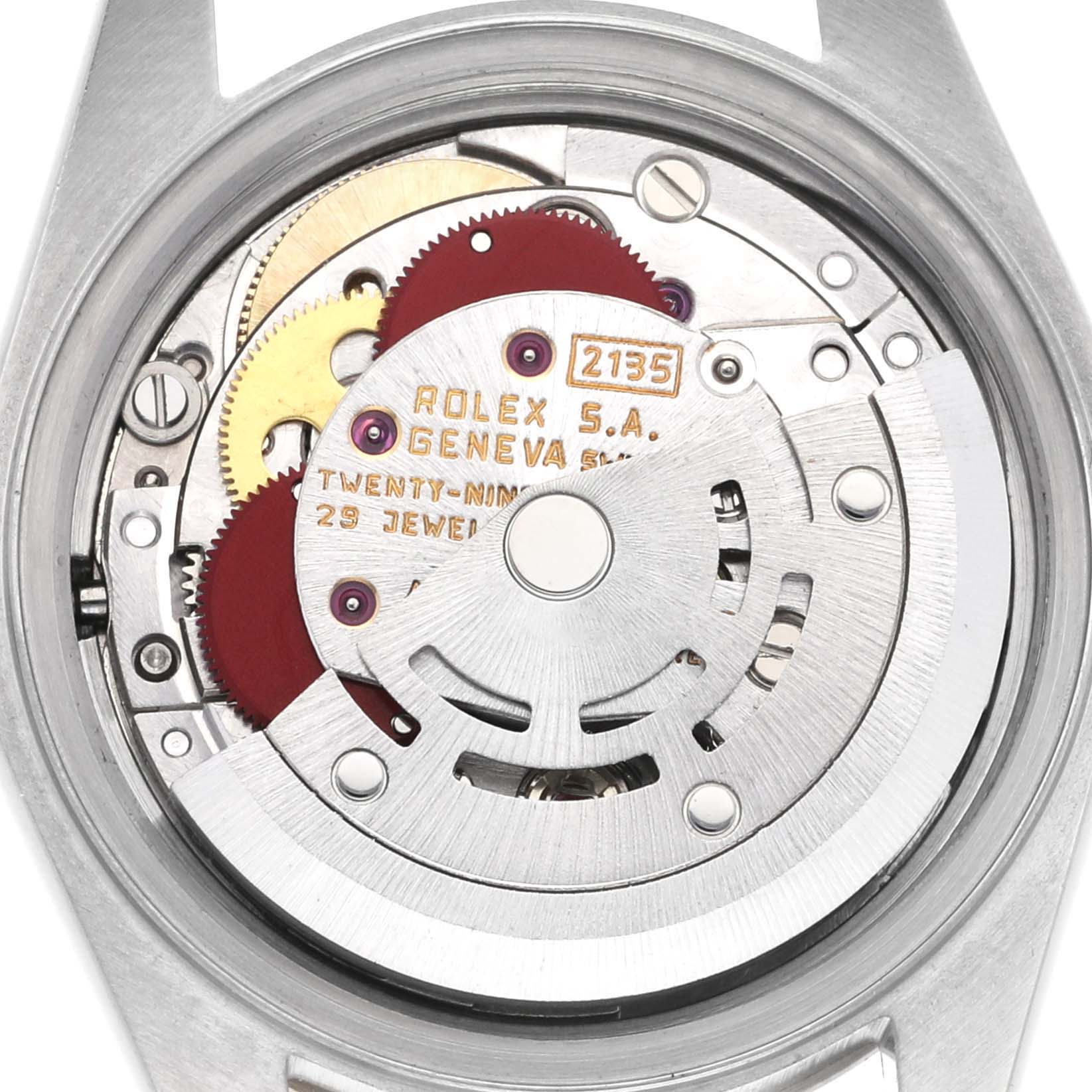 The image shows a close-up angle of the Rolex Datejust 69173 Women's Steel and Gold (two tone) Champagne Dial 69173 Women's Steel and Gold (two tone) Champagne Dial watch movement, highlighting gears and internal components.