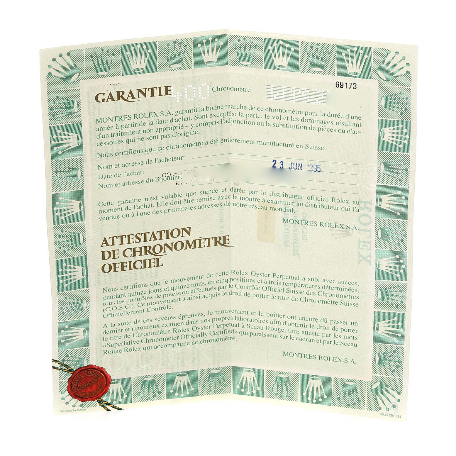 This image shows the warranty certificate for a Rolex Datejust 69173 Women's Steel and Gold (two tone) Champagne Dial 69173 Women's Steel and Gold (two tone) Champagne Dial watch, featuring text and official seals.