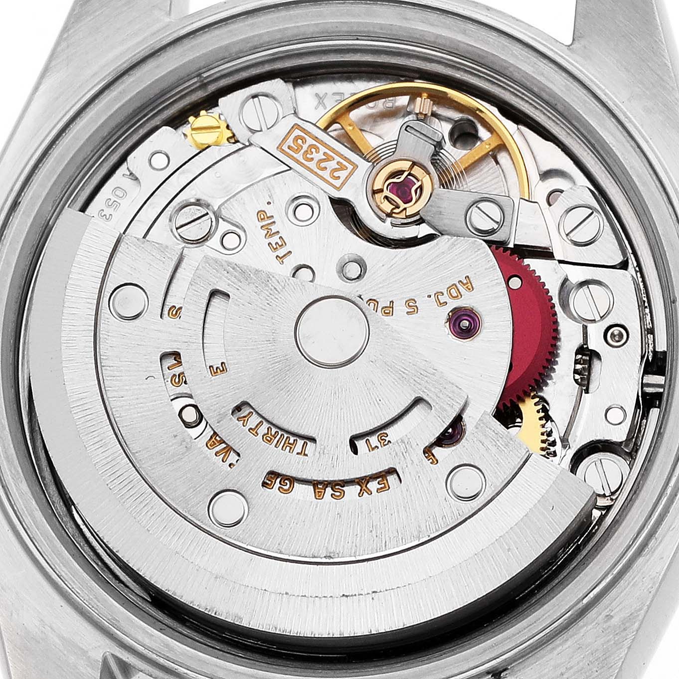 This image shows the internal movement of a Rolex Datejust 79173 Women's Steel and Gold (two tone) Mother of Pearl Dial watch from a top-down angle, highlighting the rotor and gear train components.