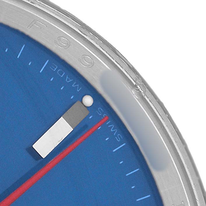 The image shows a close-up of the Rolex Turn-o-Graph 116264 Men's Stainless Steel Blue Dial watch's dial, with a focus on the blue face and red second hand.