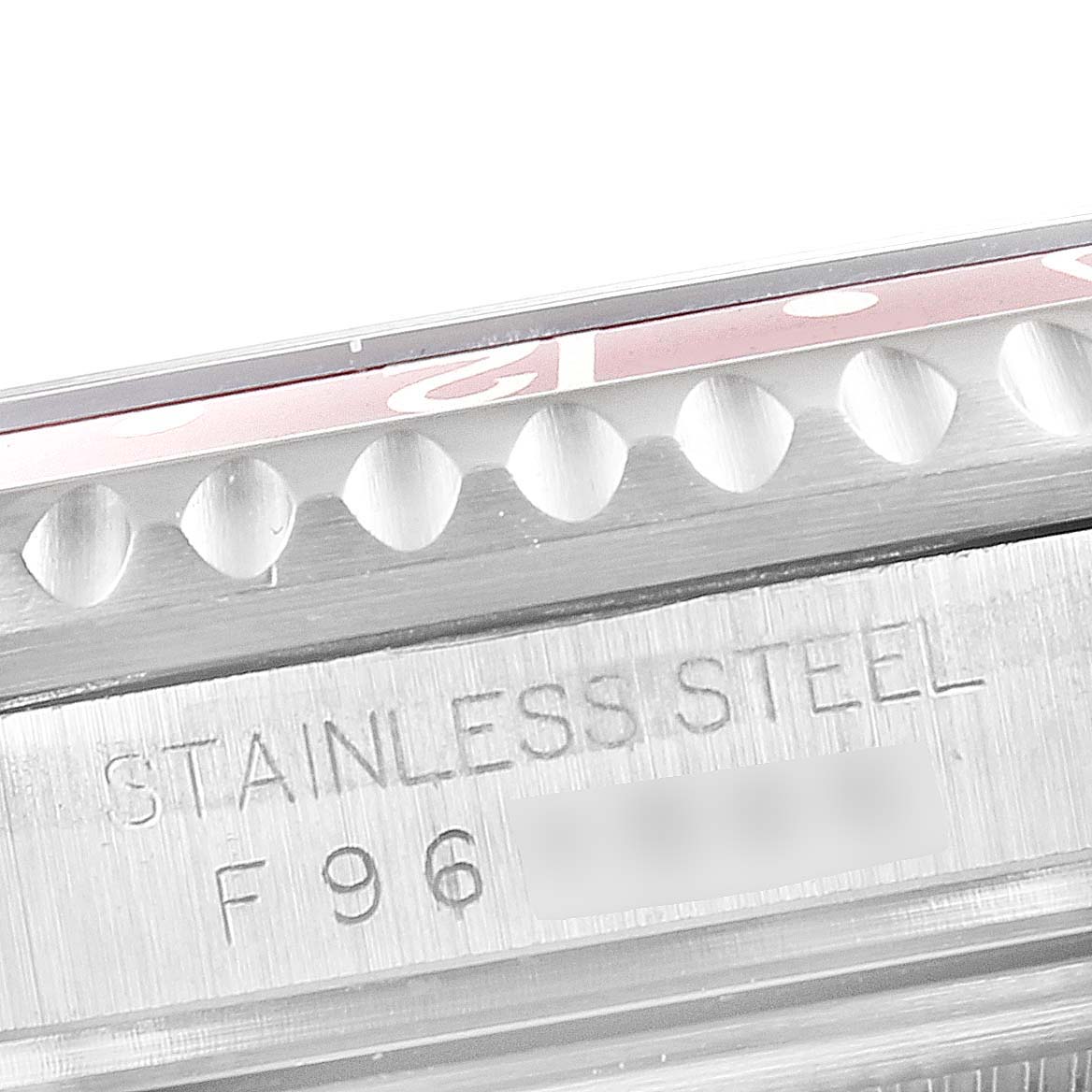 The image displays a close-up of the Rolex GMT-Master 16710 Men's Stainless Steel Black Dial 16710 Men's Stainless Steel Black Dial watch, focusing on the side profile showing the bezel and the stainless steel casing with model details.