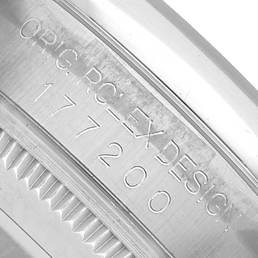 The image shows a close-up of the engraving on the inner bezel of the Rolex Oyster Perpetual 177200 Women's Stainless Steel Pink Dial watch.