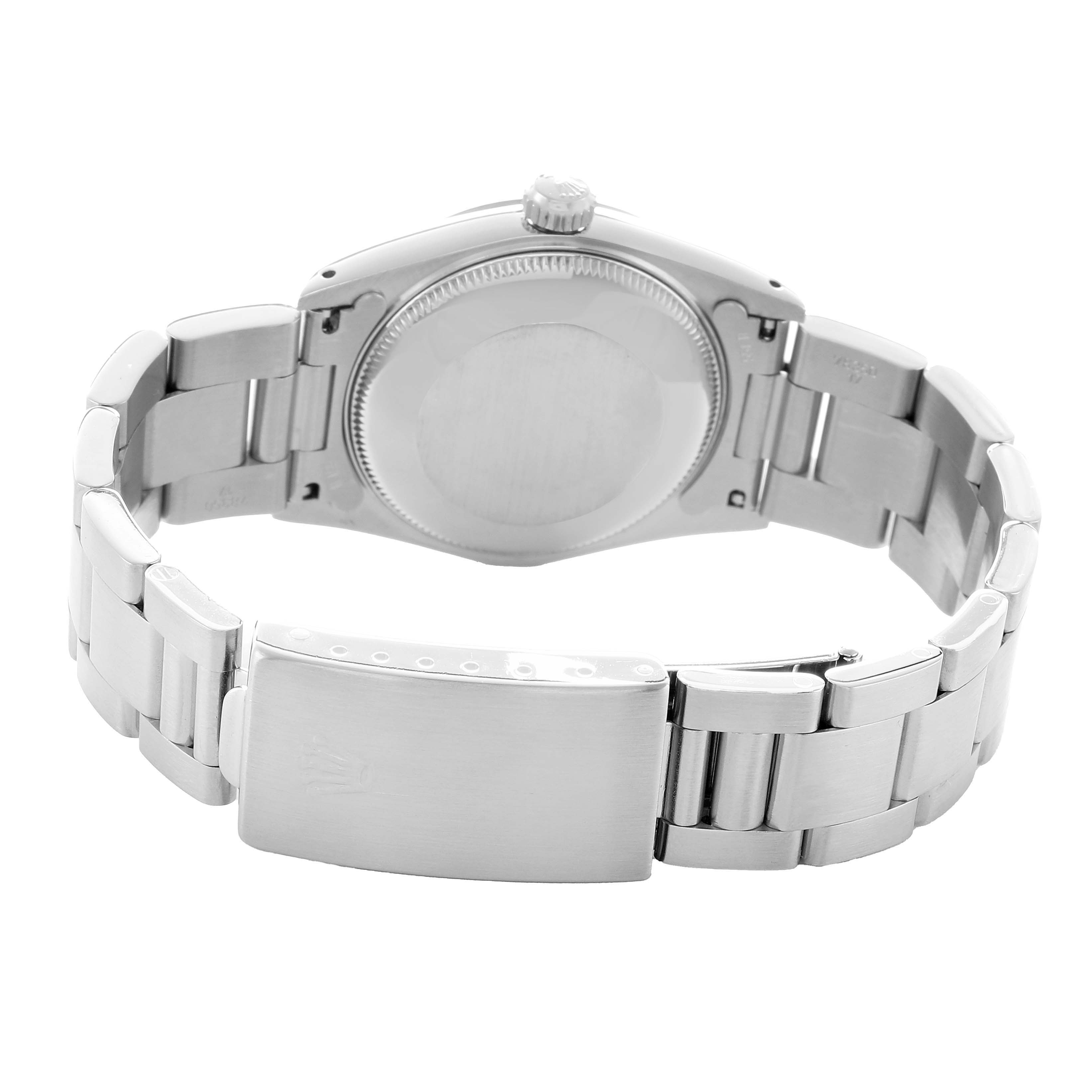 The image shows the back view of a Rolex Oyster Perpetual 67480 Women's Stainless Steel Pink Dial, highlighting the case back and bracelet with clasp.