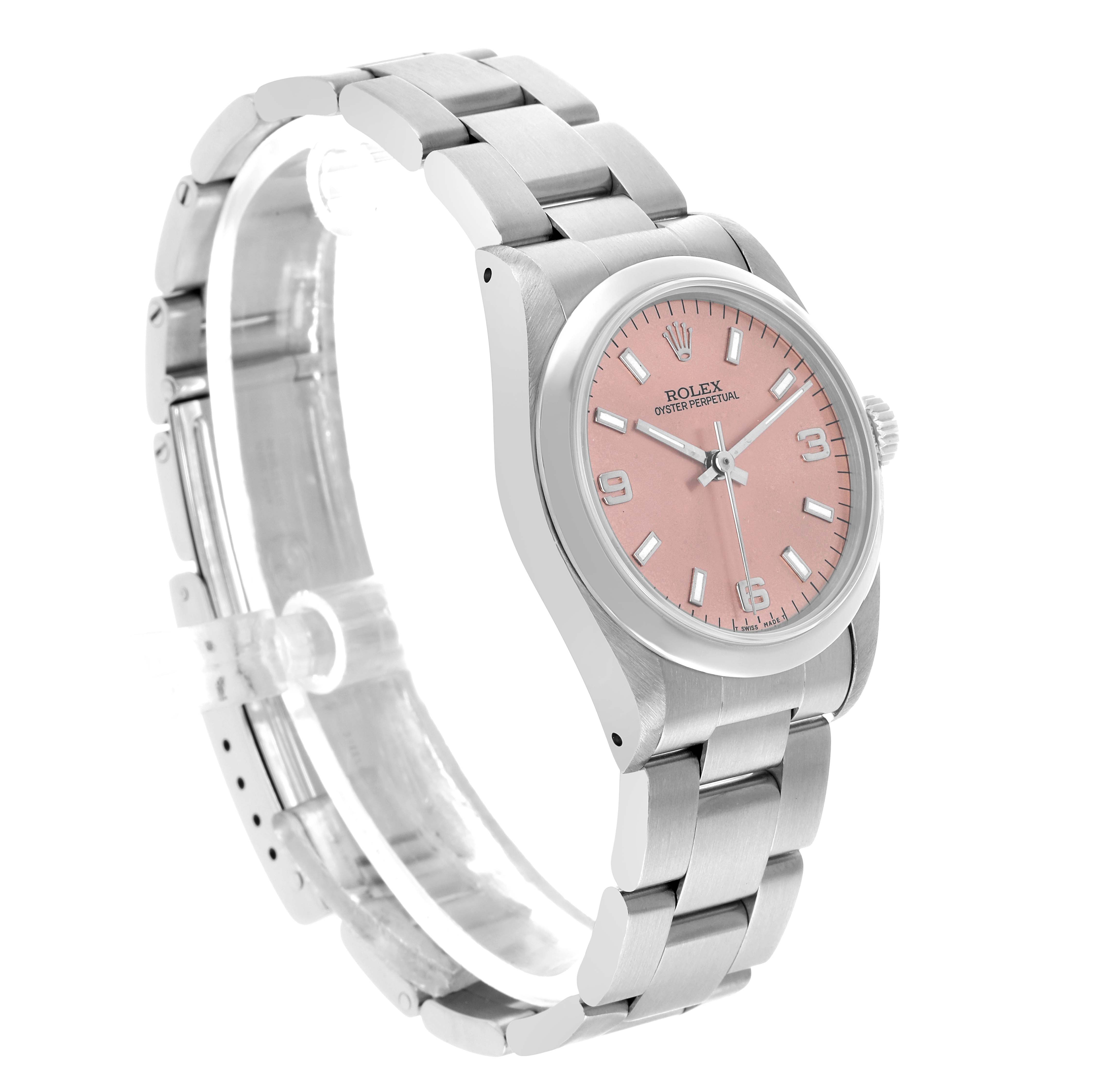 The Rolex Oyster Perpetual 67480 Women's Stainless Steel Pink Dial watch is shown at an angle highlighting the face, bracelet, and crown.