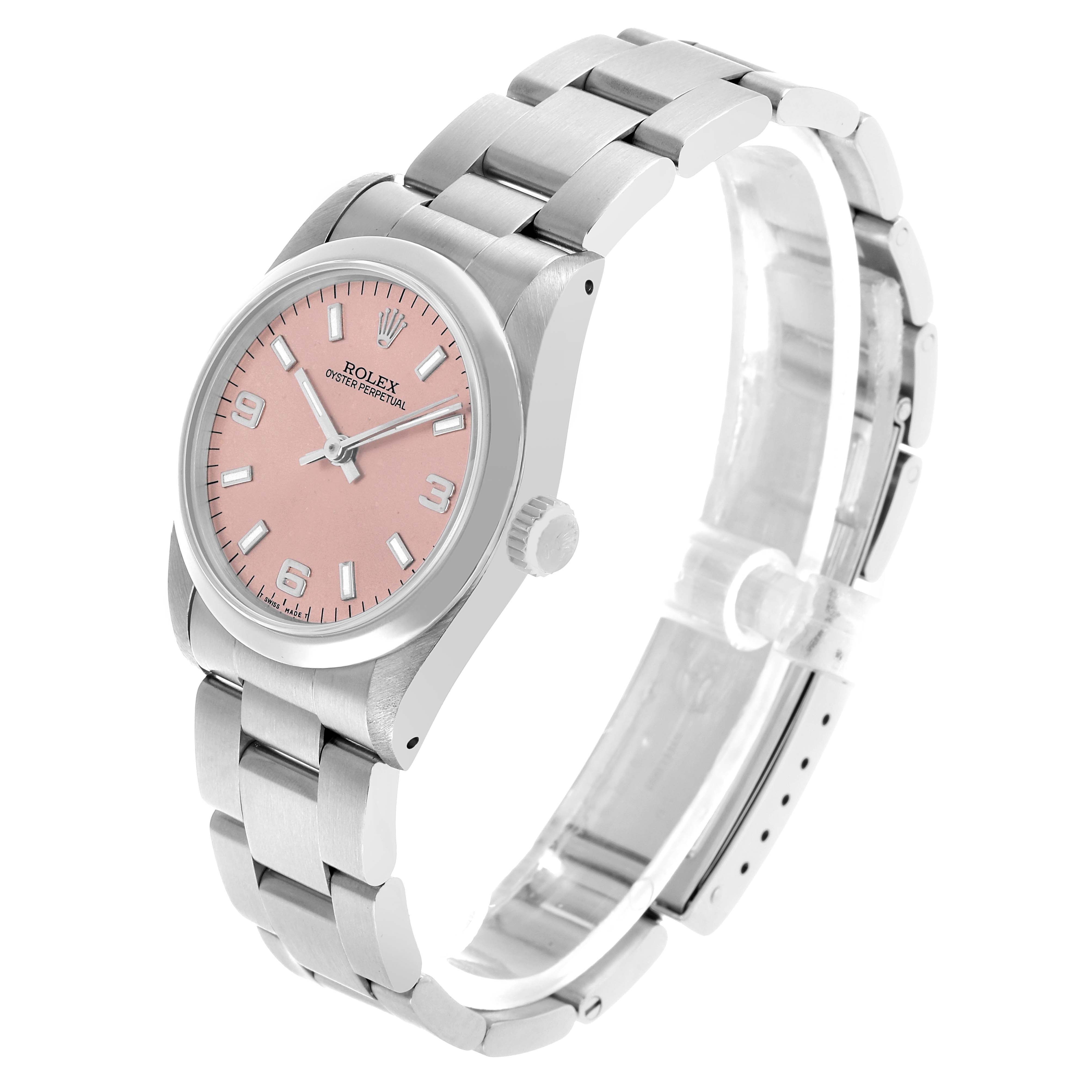 The Rolex Oyster Perpetual 67480 Women's Stainless Steel Pink Dial watch is shown at a slight angle displaying the face, bezel, bracelet, and crown.