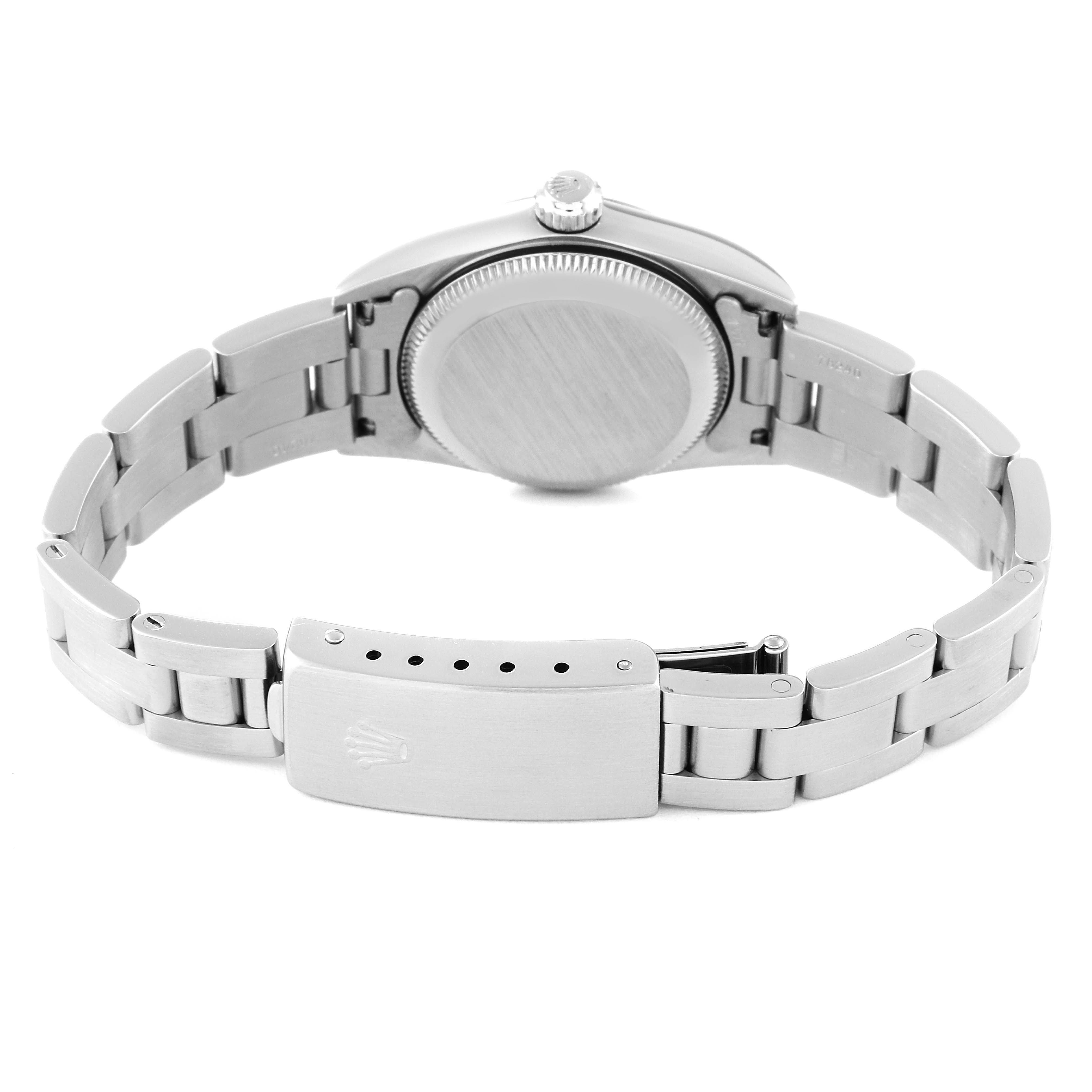 This image shows the back view of a Rolex Oyster Perpetual 76080 Women's Stainless Steel Pink Dial 76080 Women's Stainless Steel Pink Dial watch, highlighting the case back, crown, and bracelet with the clasp opened.