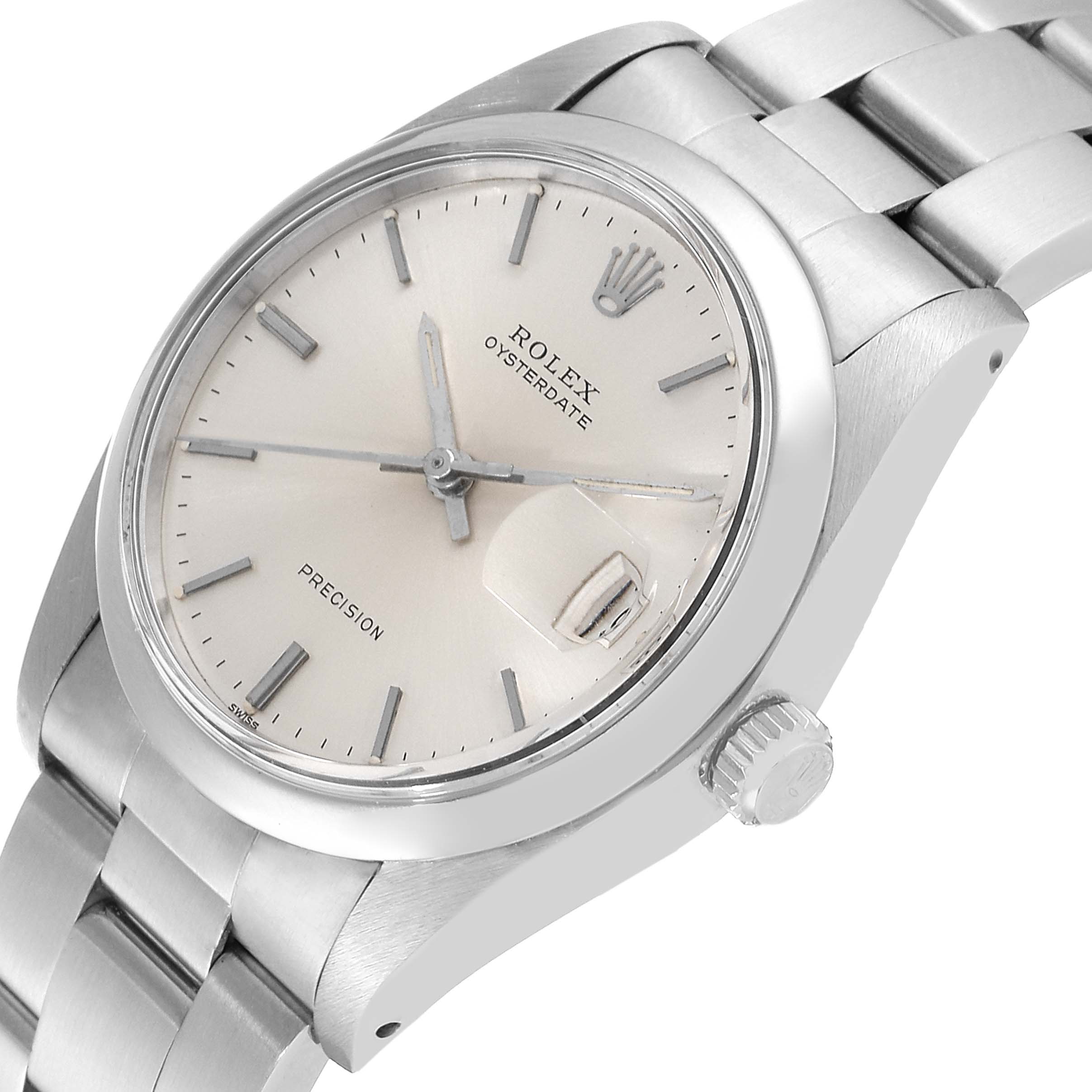The image shows a Rolex Oysterdate Precision watch at an angled view, highlighting its dial, crown, and part of the bracelet.