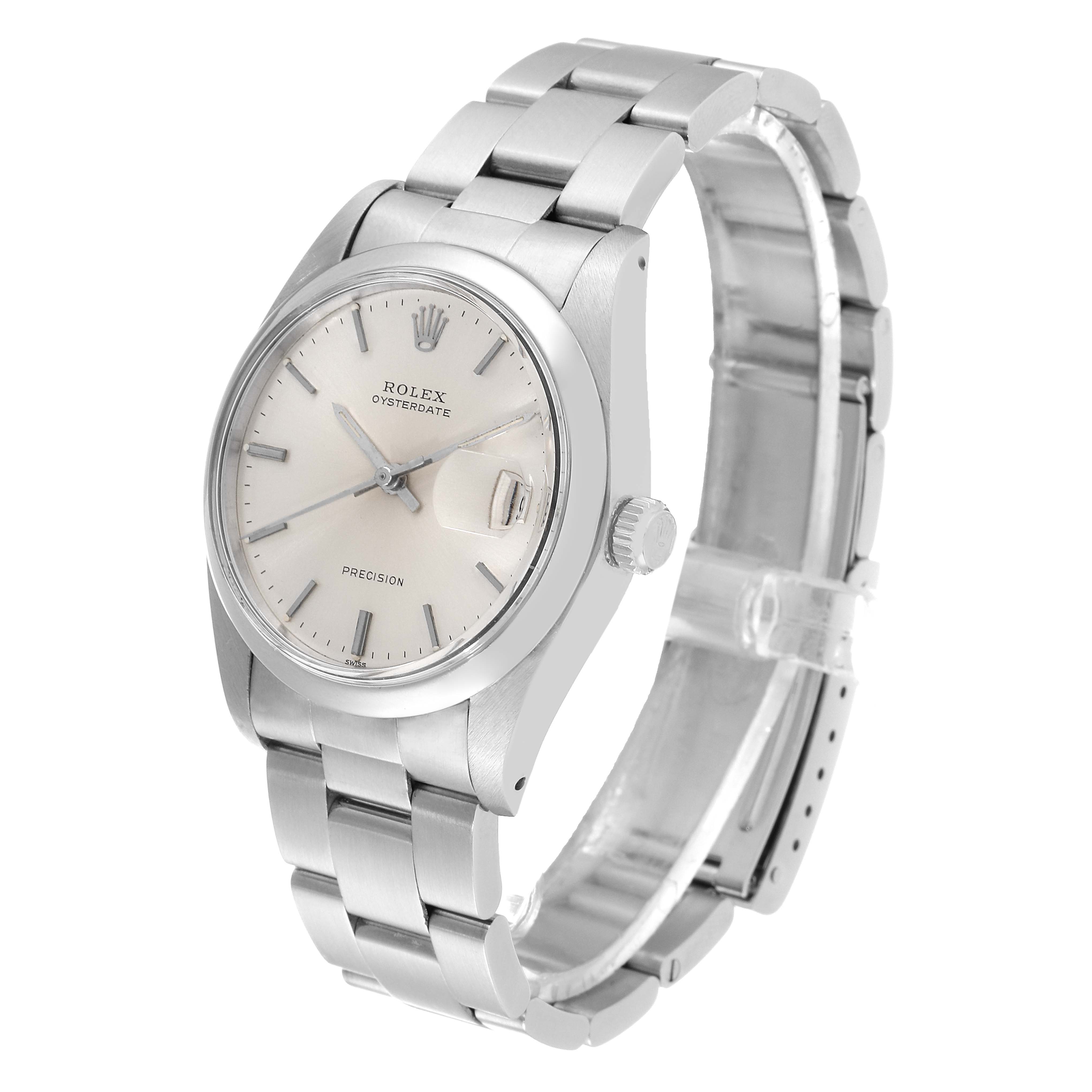 The image shows a side angle of the Rolex Date 6694 Men's Stainless Steel Silver Dial 6694 Men's Stainless Steel Silver Dial model watch, highlighting the face, bezel, crown, and bracelet.
