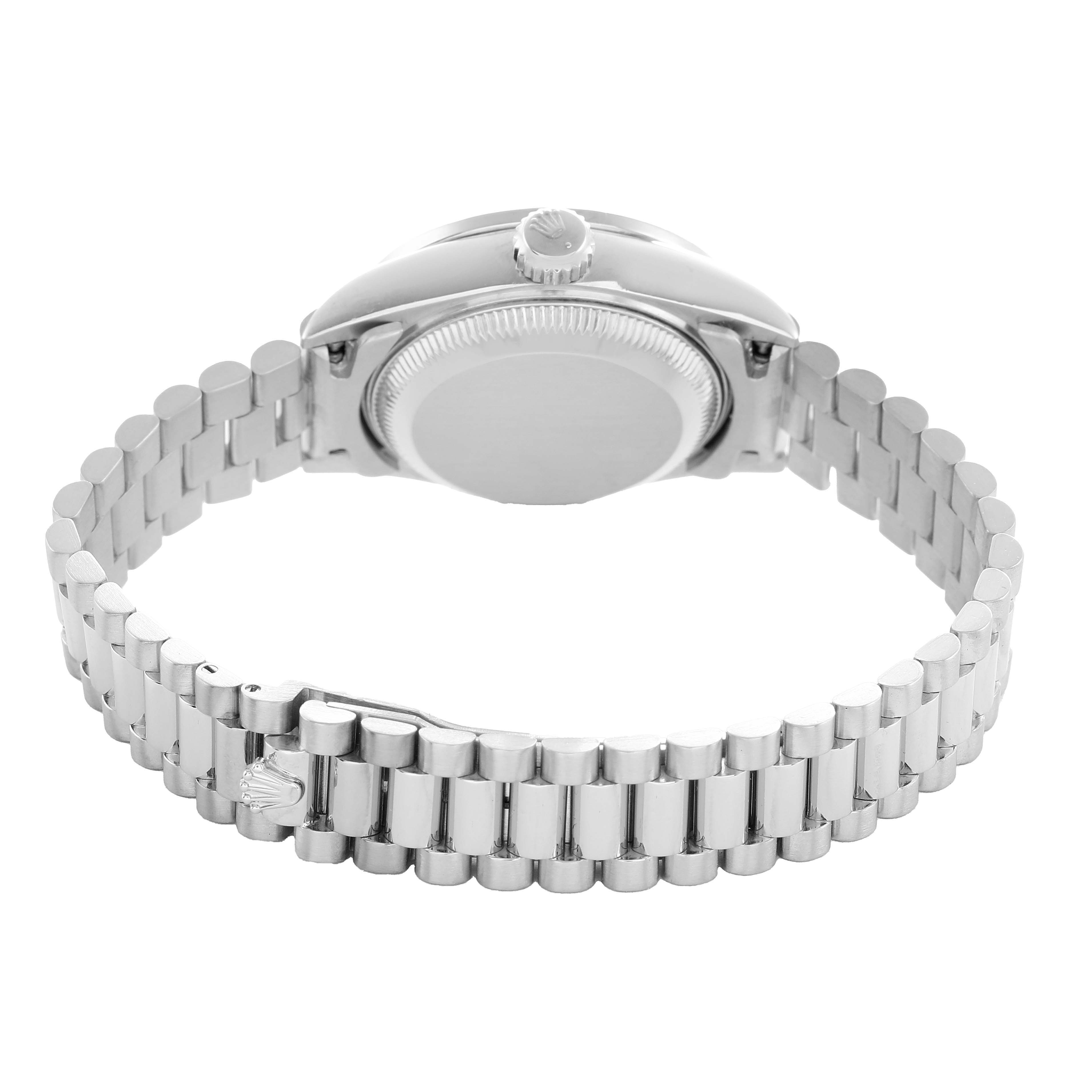 The image shows the back and bracelet of a Rolex President 69136 Women's Platinum Silver Dial model watch from a rear angle.