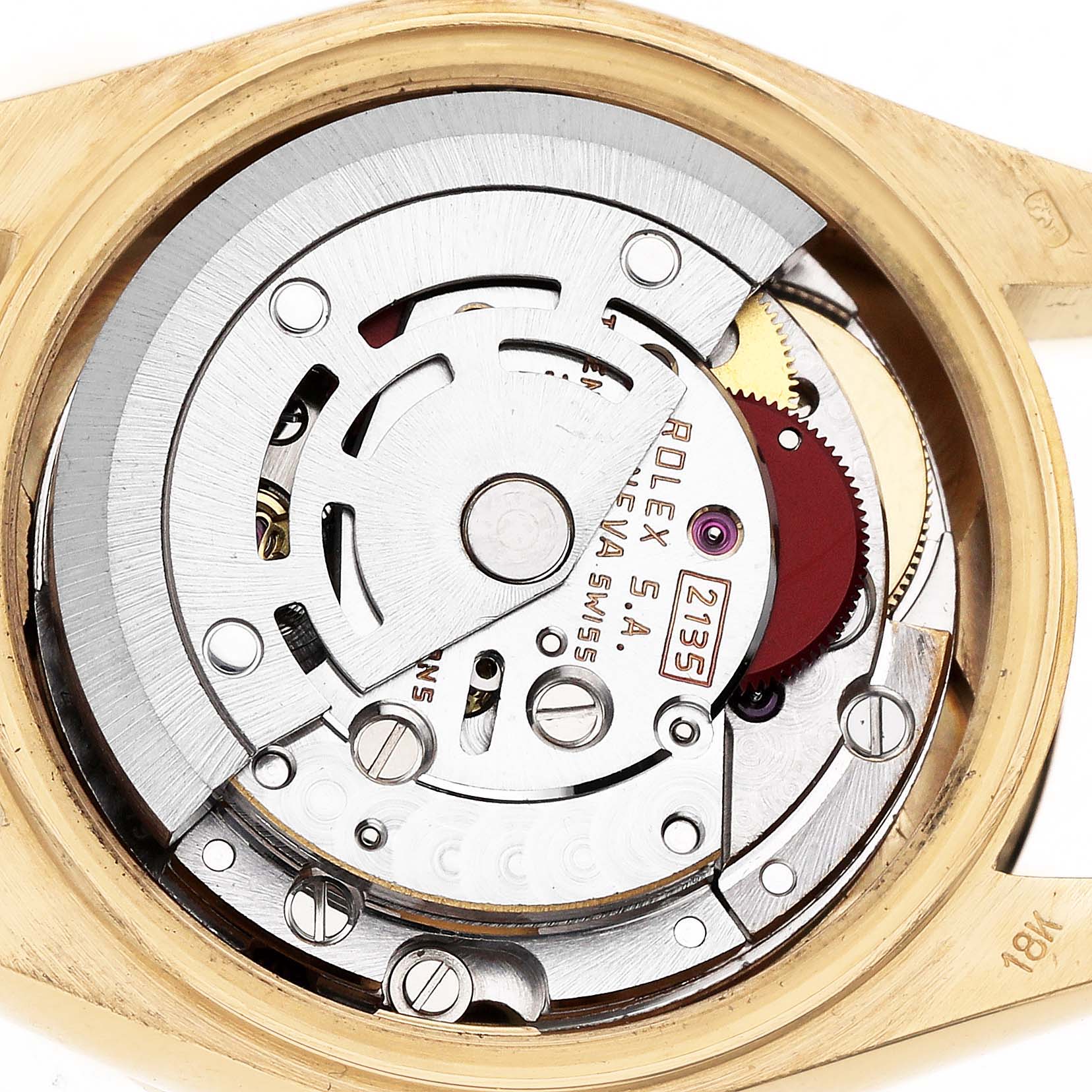 The image shows the movement of a Rolex President 69088 Women's Yellow Gold Blue Dial, highlighting its intricate internal components and rotor.