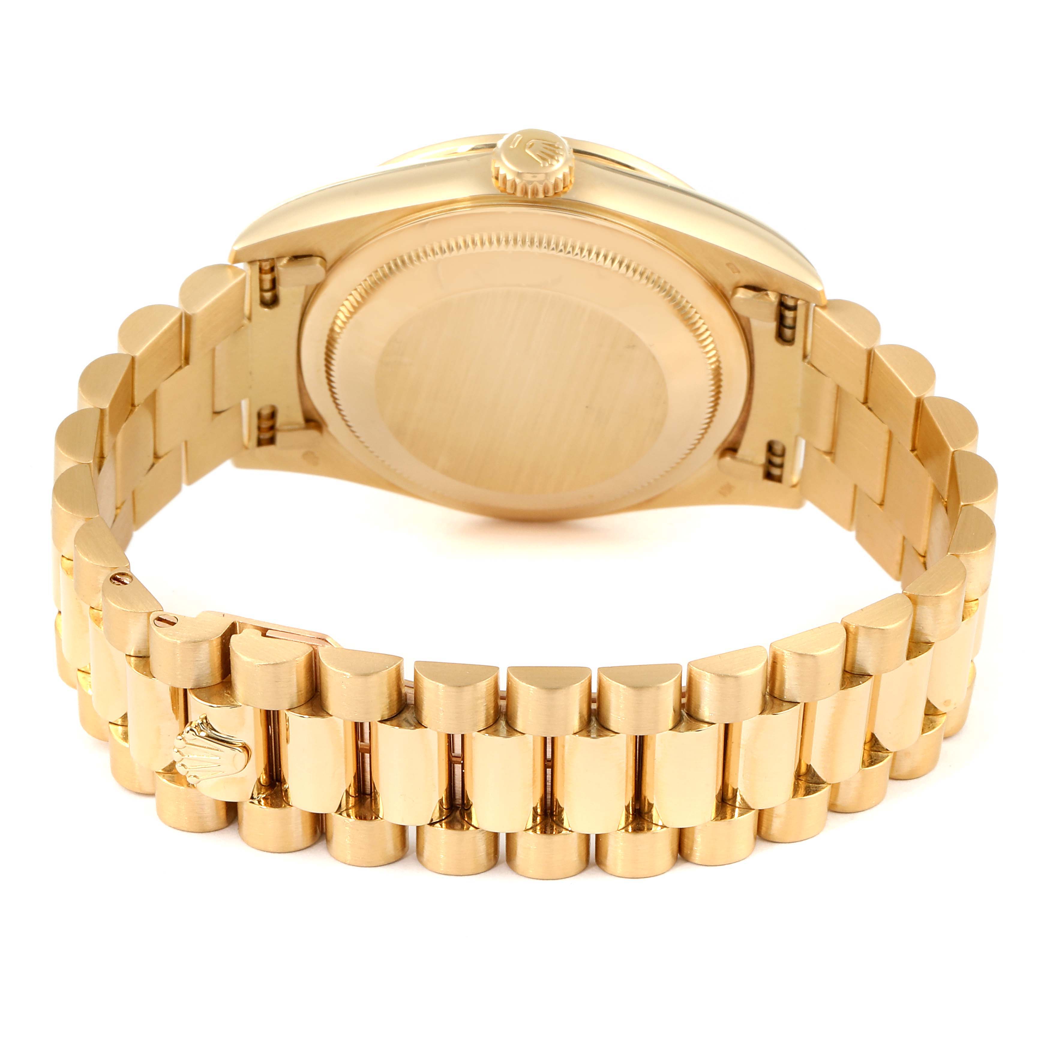 The Rolex President 18388 Men's Yellow Gold Brown Dial 18388 Men's Yellow Gold Brown Dial model watch is shown from the rear, highlighting its case back, crown, and bracelet links.