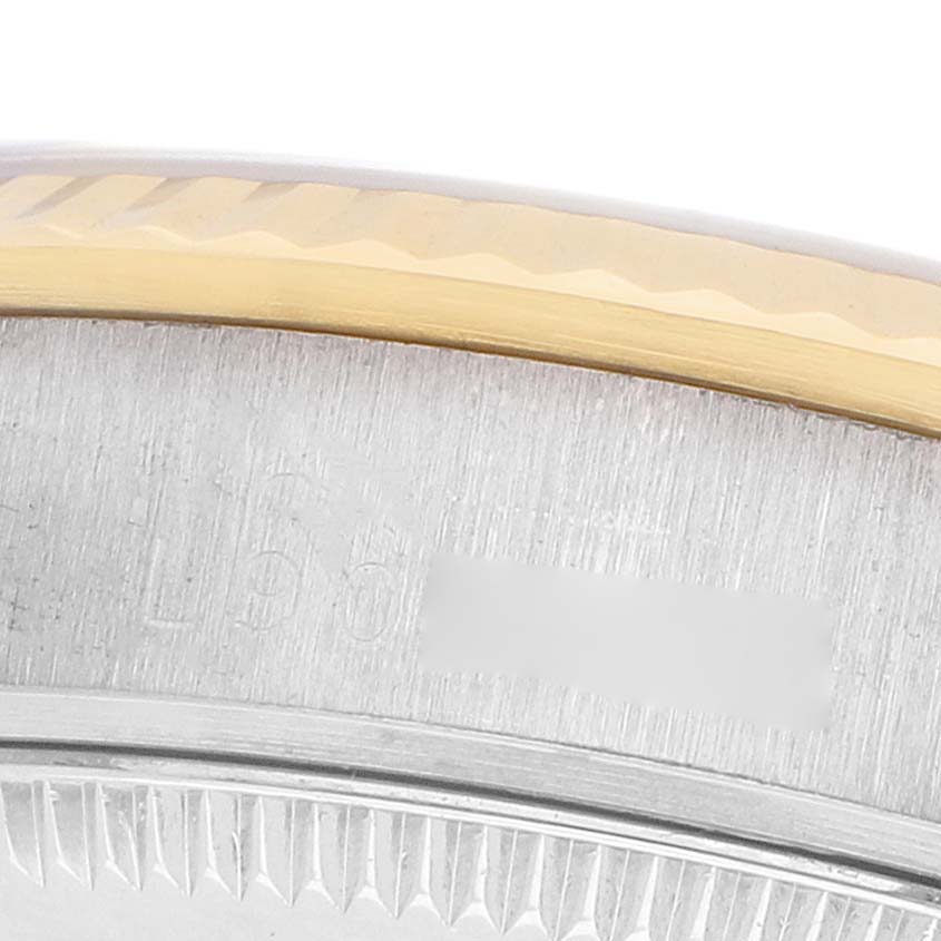 The image shows a close-up of the bezel and case edge of a Rolex President 68279 Women's White Gold Brown Dial watch, highlighting the brushed metal and gold detail.