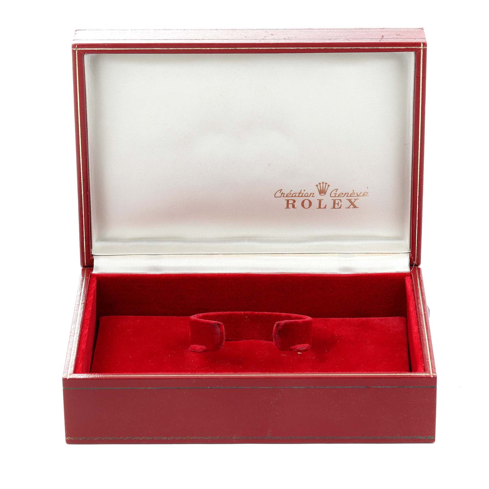 The image shows an open red Rolex watch box, likely for the President model, with a white interior and Rolex branding.