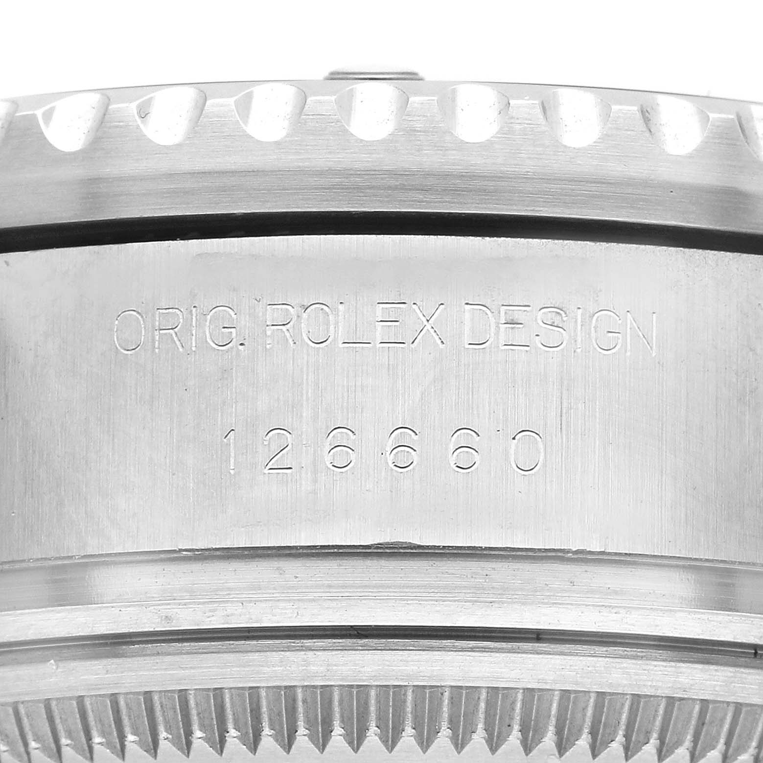 The image shows a close-up side view of a Rolex Sea-Dweller 126660 Men's Stainless Steel Black Dial watch, focusing on the engraved model number "126660" and design text.