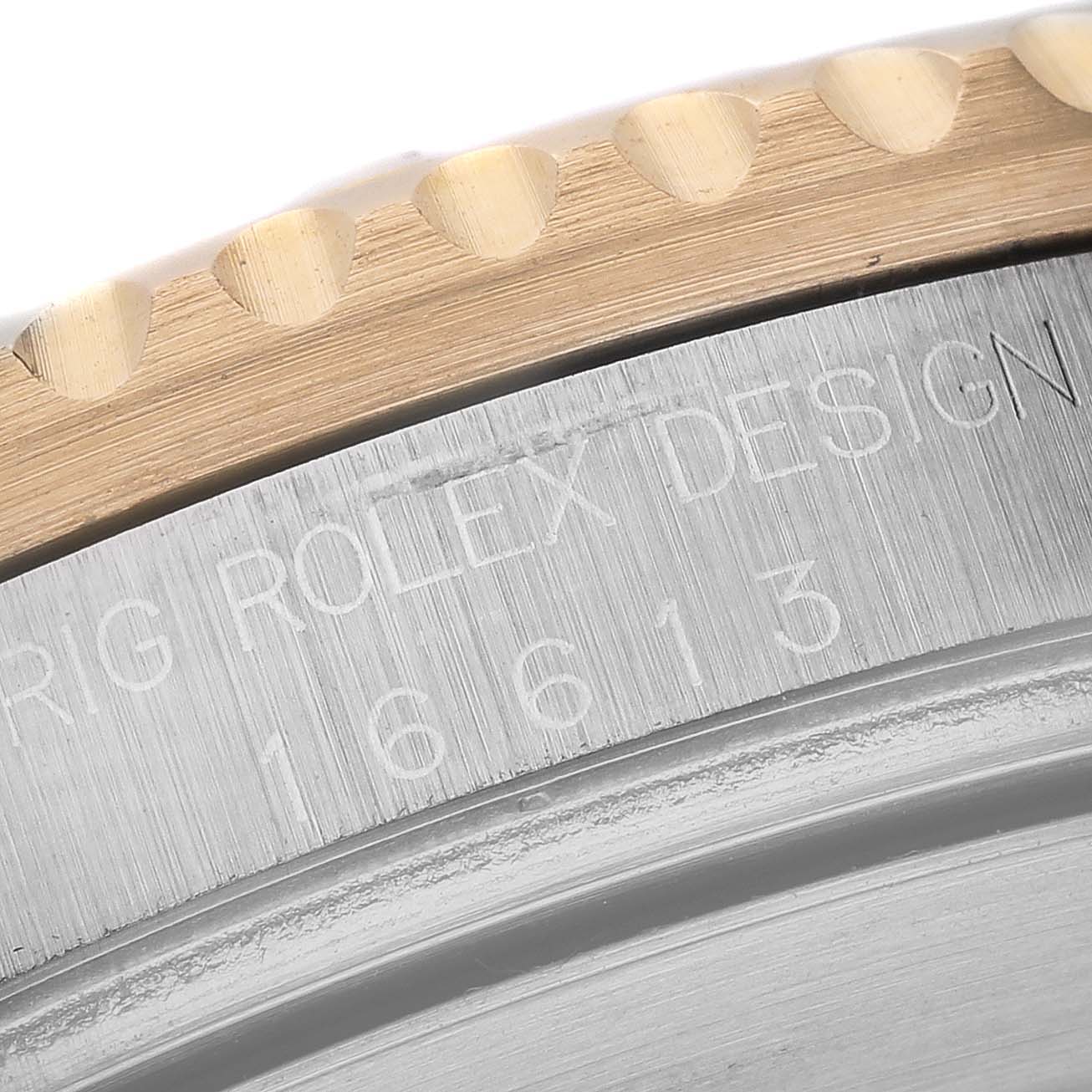 This close-up image shows the bezel and partial case of the Rolex Submariner 16613 Men
s Steel and Gold (two tone) Blue Dial 16613 Men
s Steel and Gold (two tone) Blue Dial, highlighting the engraved model number "16613."