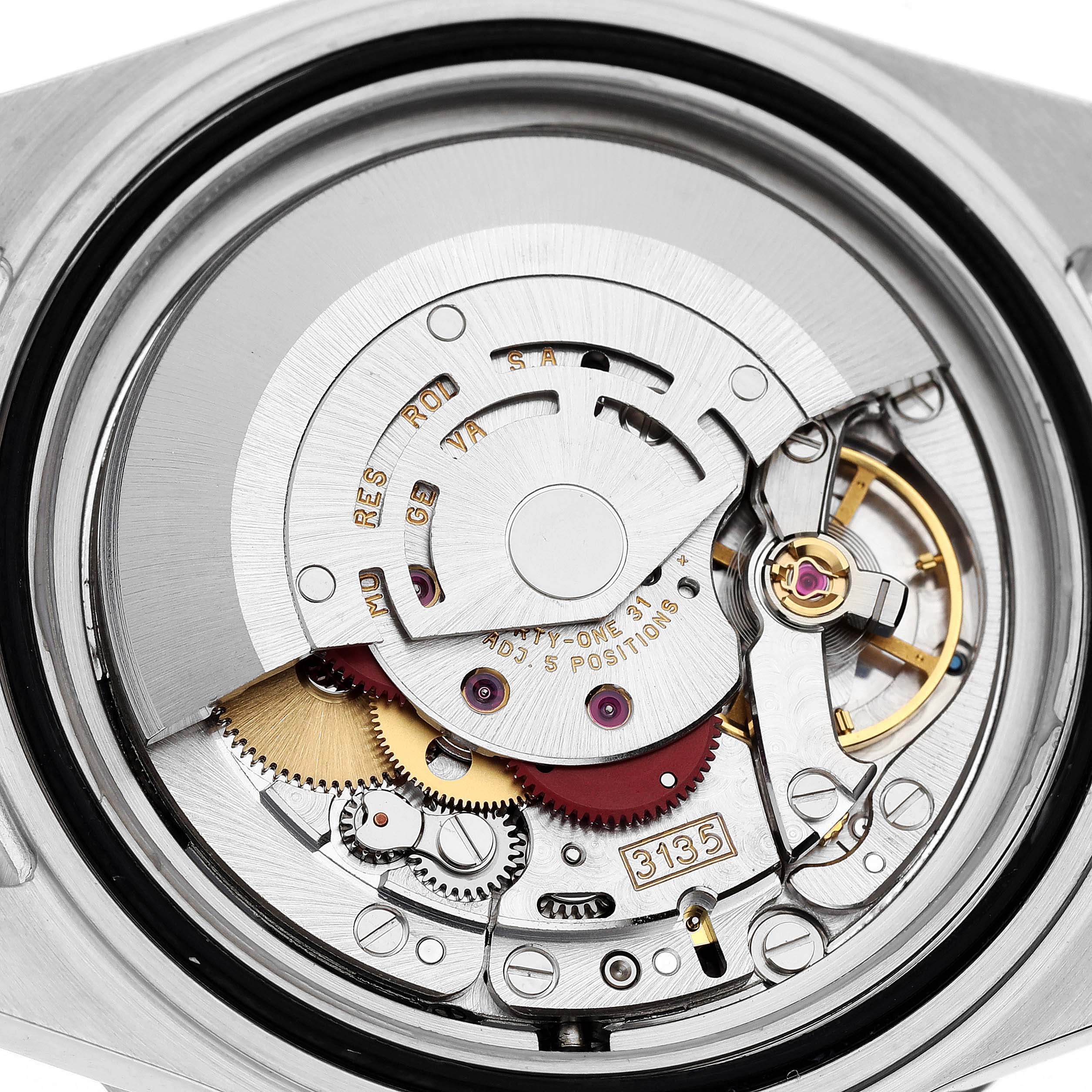 The image shows the intricate movement mechanics and internal components of the Rolex Submariner 16613 Men
s Steel and Gold (two tone) Blue Dial 16613 Men
s Steel and Gold (two tone) Blue Dial watch from a close-up angle.