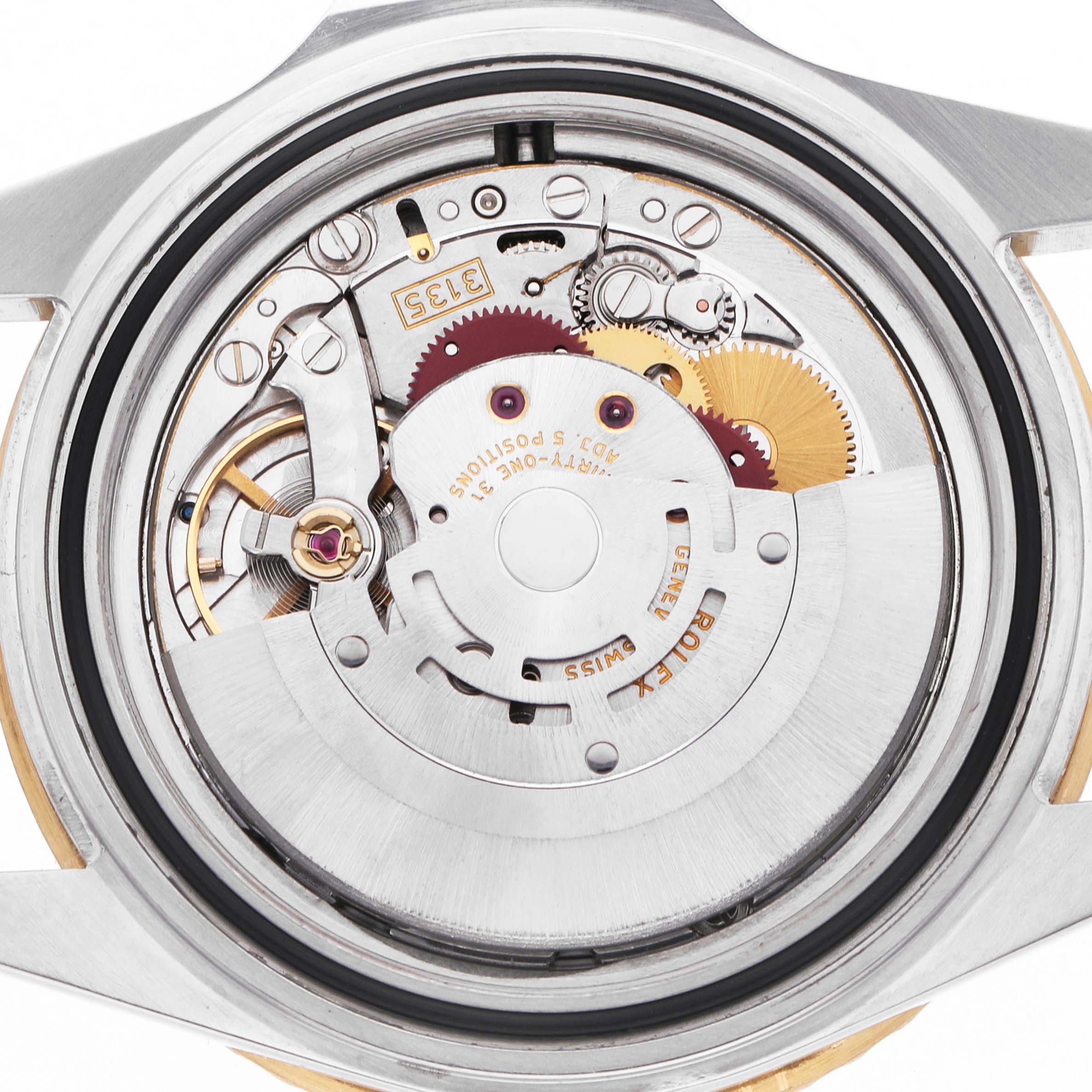 The image shows the open case back of a Rolex Submariner 16613 Men's Steel and Gold (two tone) Black Dial, revealing its intricate movement parts and mechanisms.