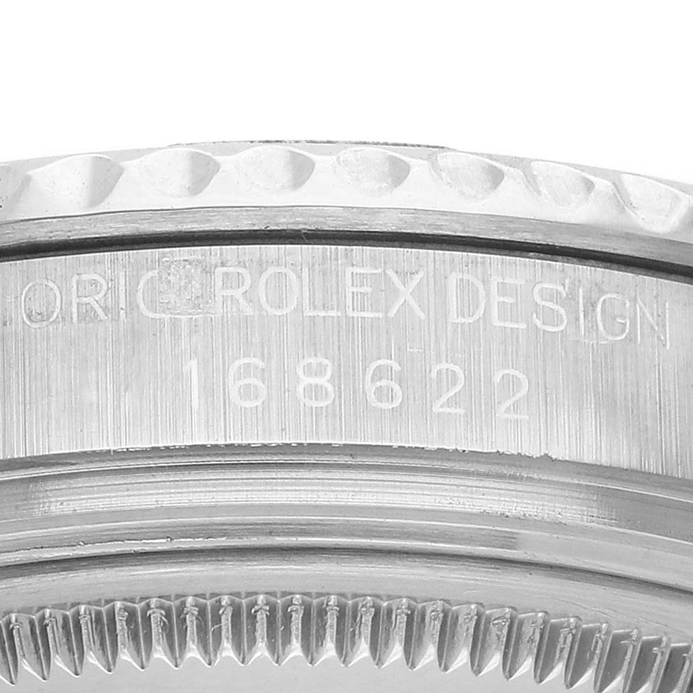 The image shows a close-up of the side engraving and bezel teeth of a Rolex Yacht-Master 168622 Men's Stainless Steel Silver Dial watch.