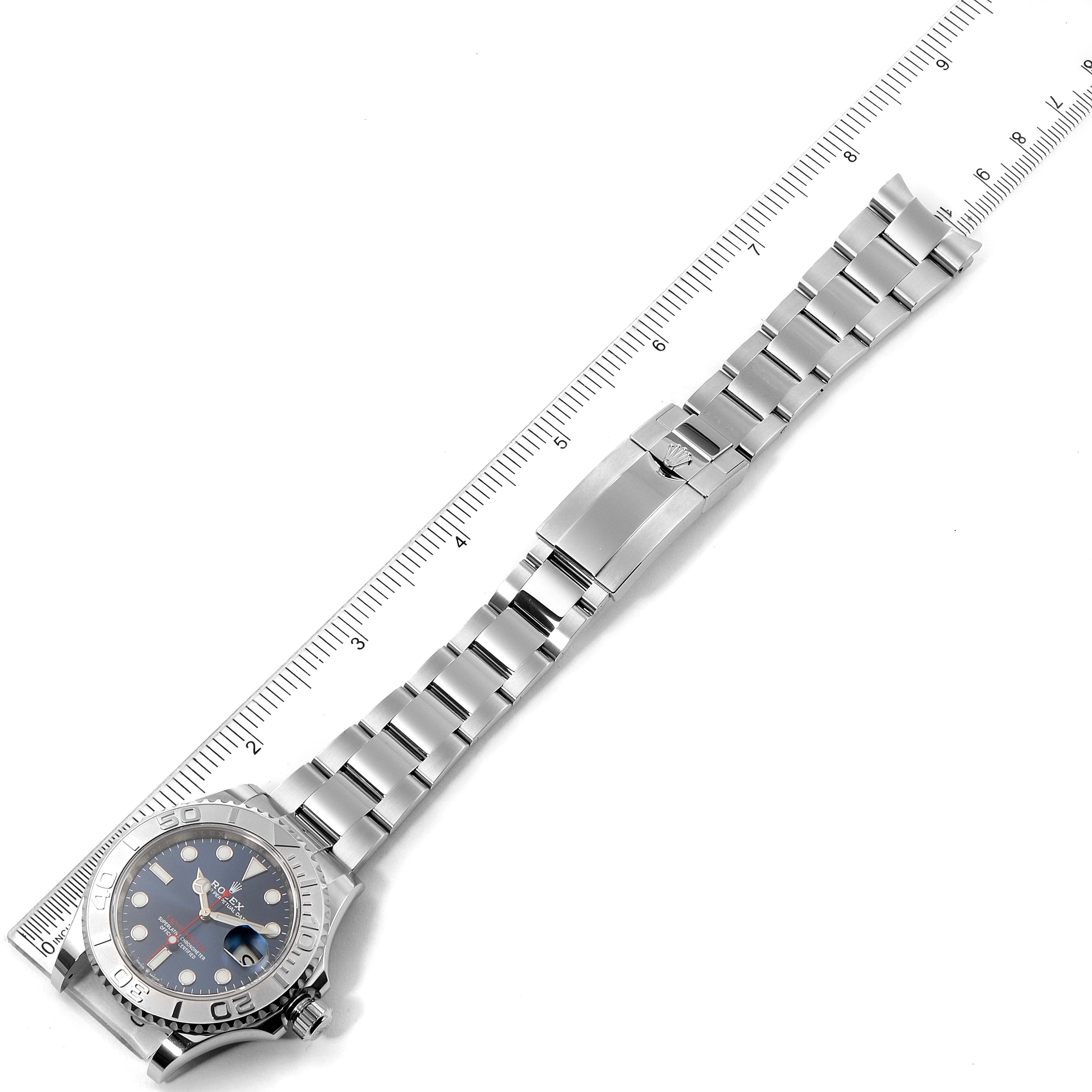 This image shows the Rolex Yacht-Master 126622 Men's Stainless Steel Blue Dial 126622 Men's Stainless Steel Blue Dial watch laid flat, showcasing the full length of the bracelet and the face at an overhead angle.