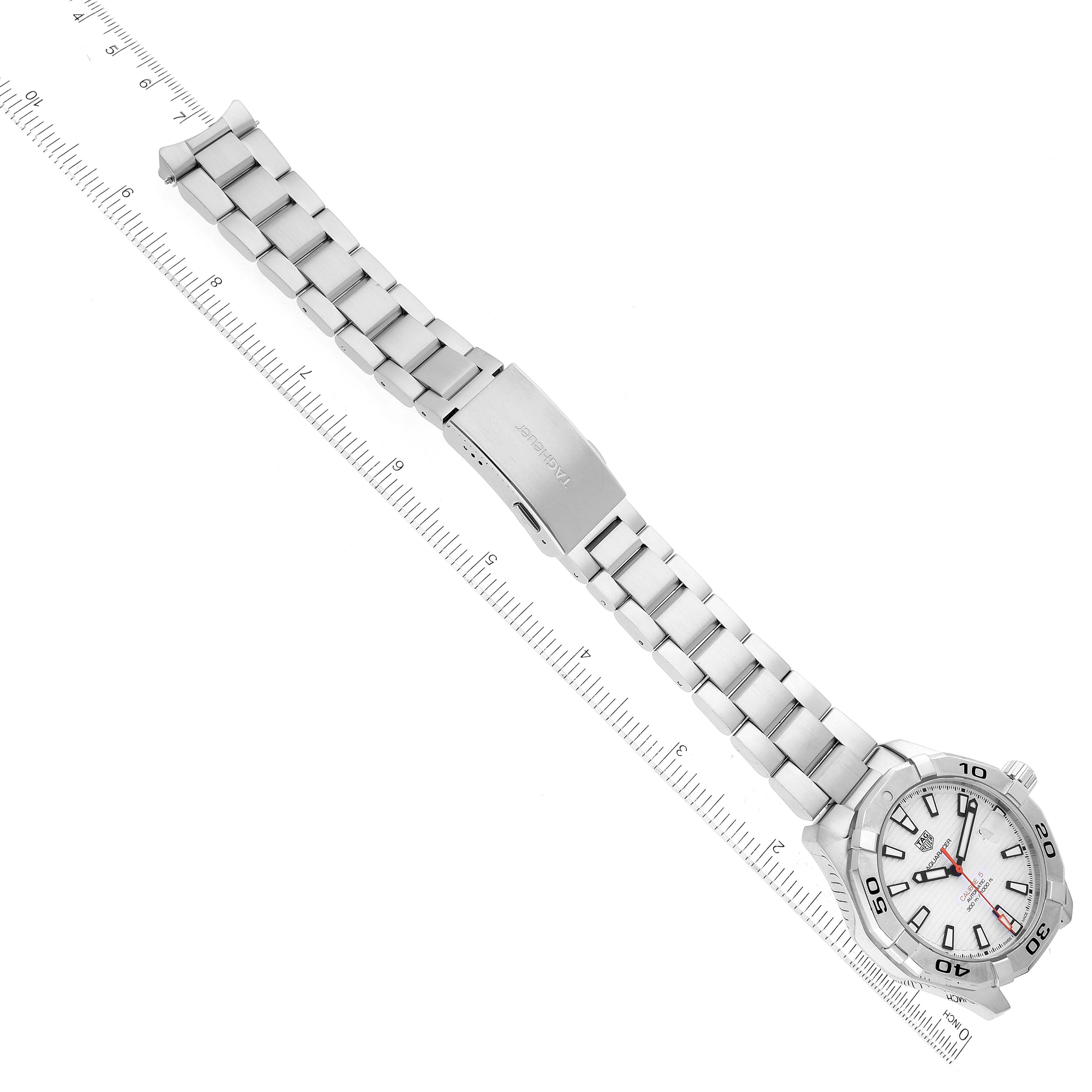 The image shows a top-down view of a Tag Heuer Aquaracer WAY2013.BA0927 Men's Stainless Steel White Dial WAY2013.BA0927 Men's Stainless Steel White Dial watch, highlighting the white dial, bezel, and metal bracelet with clasp.