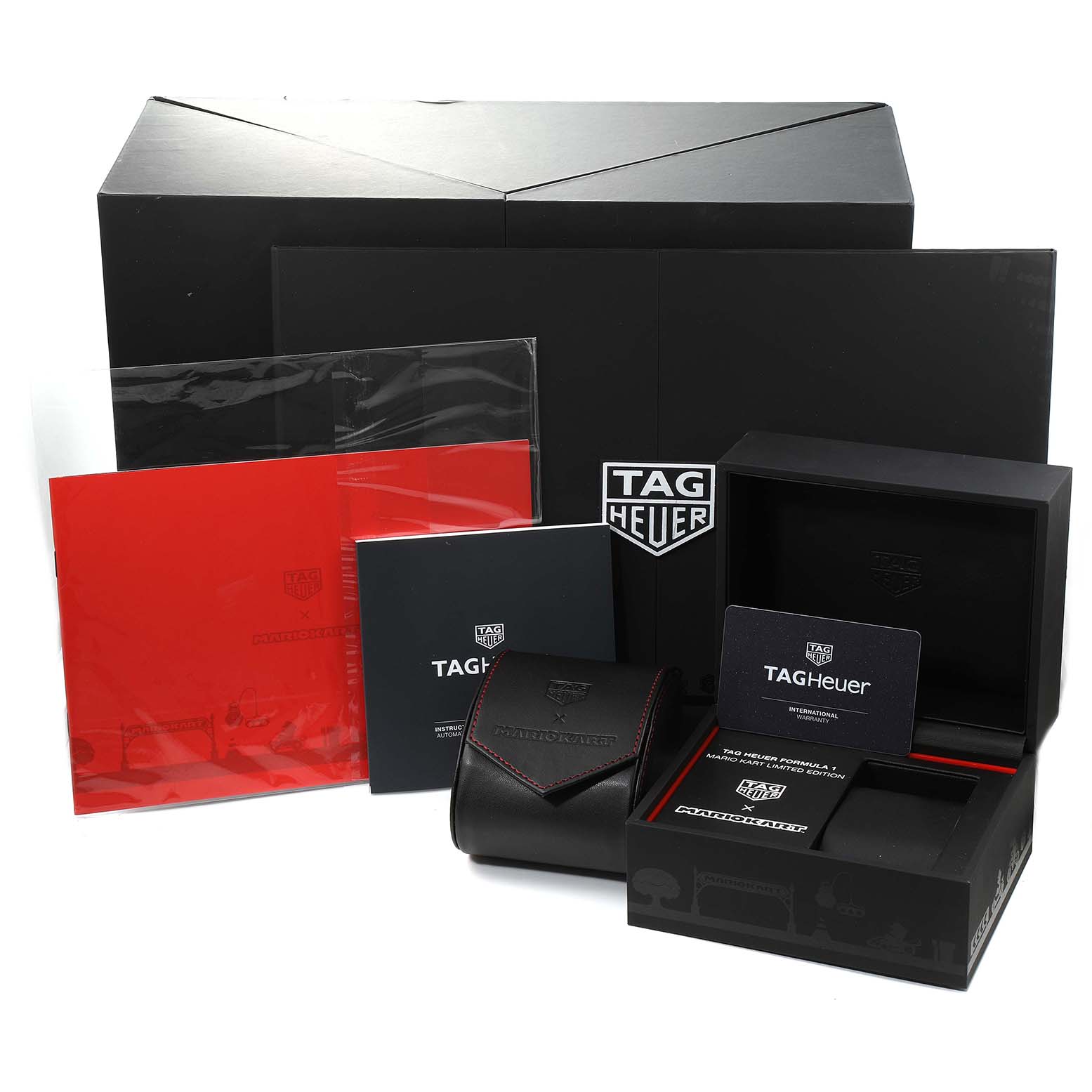 The image shows the packaging and accessories of the Tag Heuer Limited Edition CAZ201E.FC6517 Men's Stainless Steel Black Dial CAZ201E.FC6517 Men's Stainless Steel Black Dial watch, including boxes, pouches, and manuals.