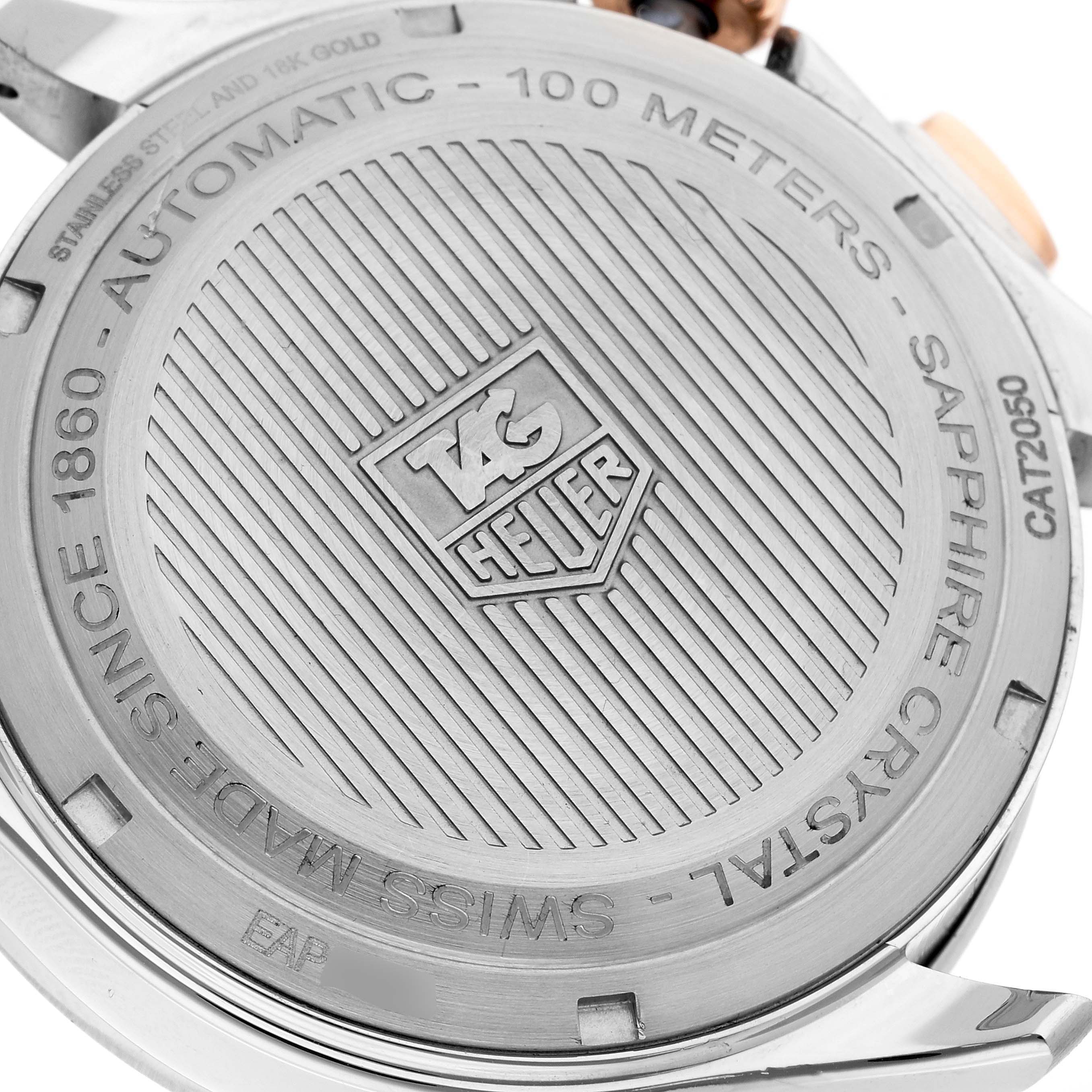 The image shows the back case of a Tag Heuer Link CAT2050 Men's Steel and Gold (two tone) Silver Dial CAT2050 Men's Steel and Gold (two tone) Silver Dial model watch, displaying the brand, material, and water resistance details.