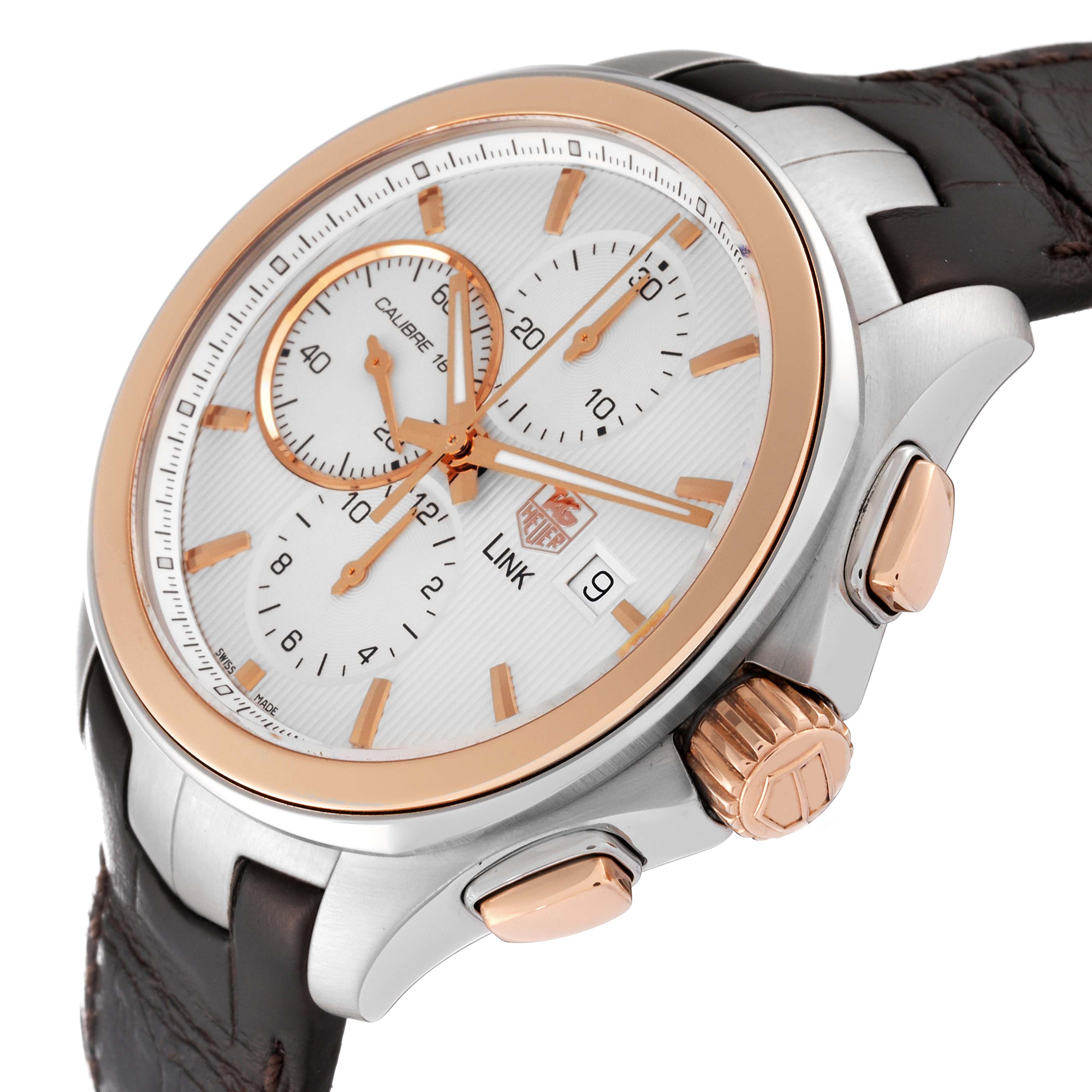 This Tag Heuer Link CAT2050 Men's Steel and Gold (two tone) Silver Dial CAT2050 Men's Steel and Gold (two tone) Silver Dial watch is shown from an angled side view, highlighting its face, crown, pushers, and leather strap.