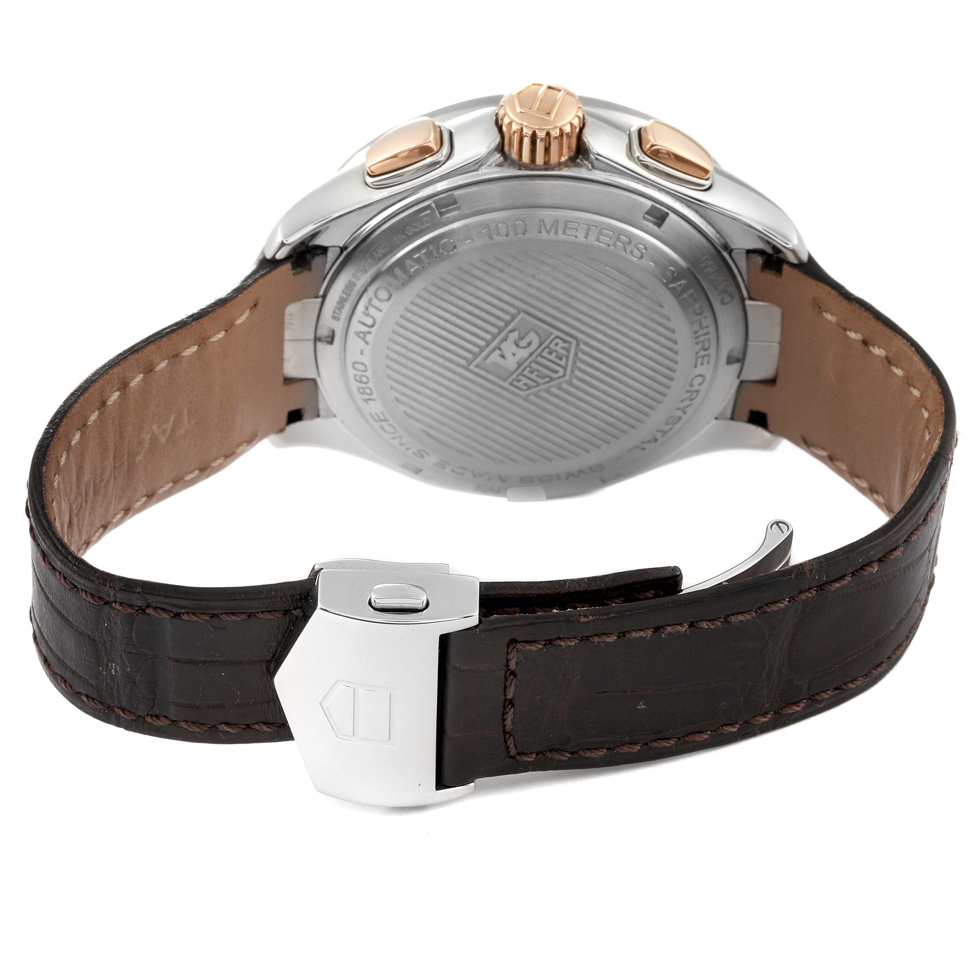 The image shows the back view of a Tag Heuer Link CAT2050 Men's Steel and Gold (two tone) Silver Dial CAT2050 Men's Steel and Gold (two tone) Silver Dial model watch, focusing on the case back, crown, and leather strap with a clasp.