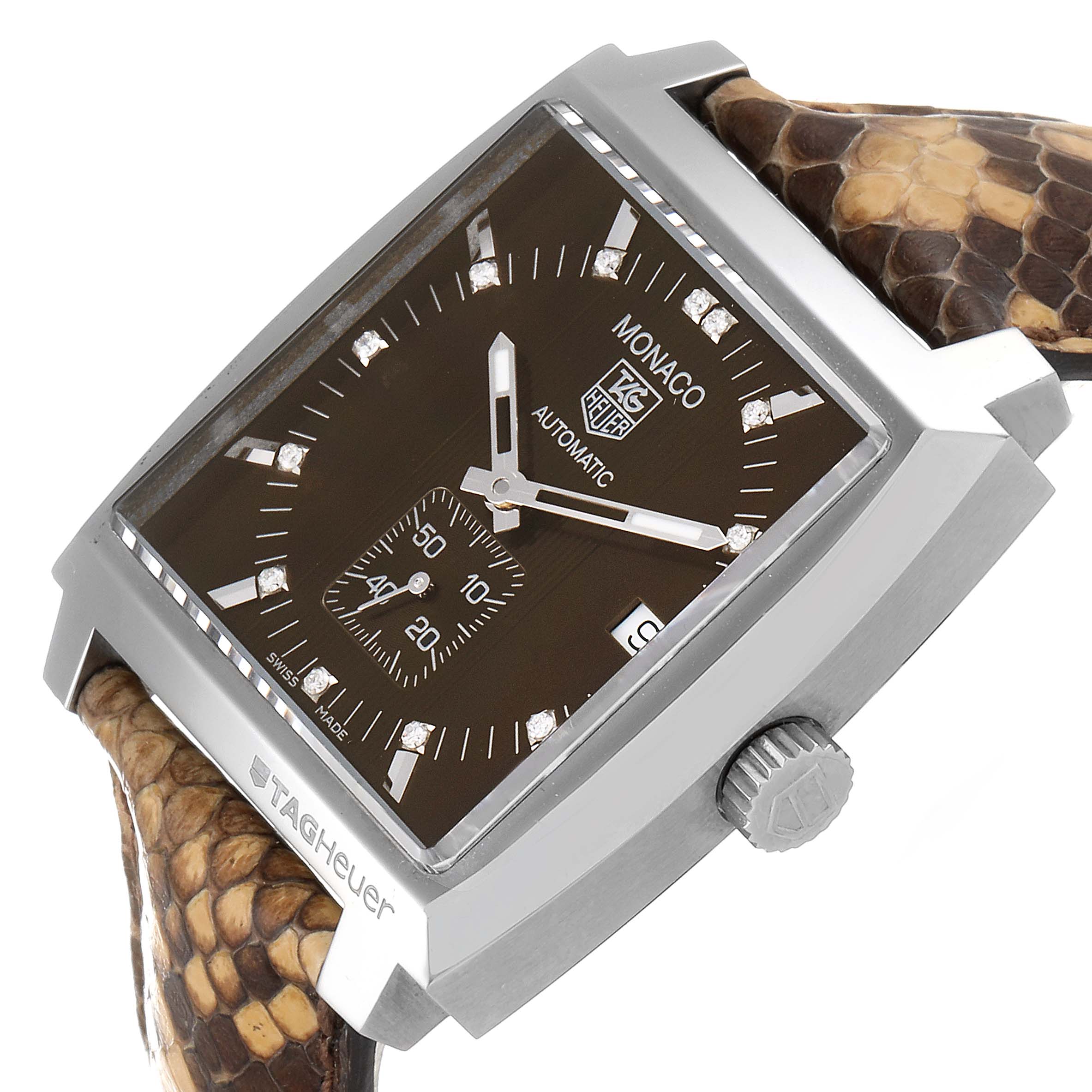 The image shows a close-up of the Tag Heuer Monaco WW2116.FC6217 Men's Stainless Steel Brown Dial WW2116.FC6217 Men's Stainless Steel Brown Dial watch at an angle, displaying its face, crown, and strap.