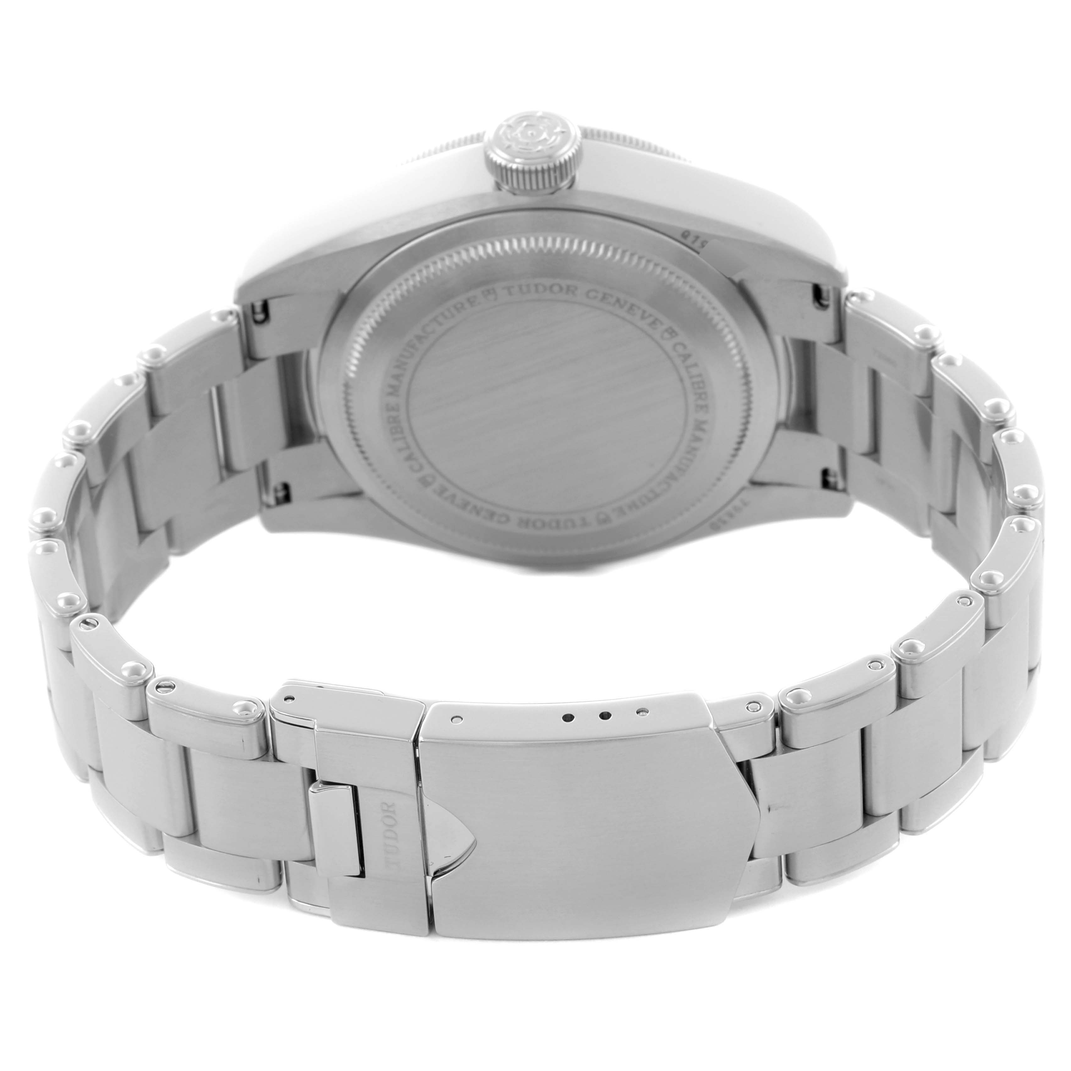 The image shows the back view of a Tudor Heritage Black Bay 79830RB Men's Stainless Steel Black Dial 79830RB Men's Stainless Steel Black Dial watch, highlighting the case back and metal bracelet with clasp.