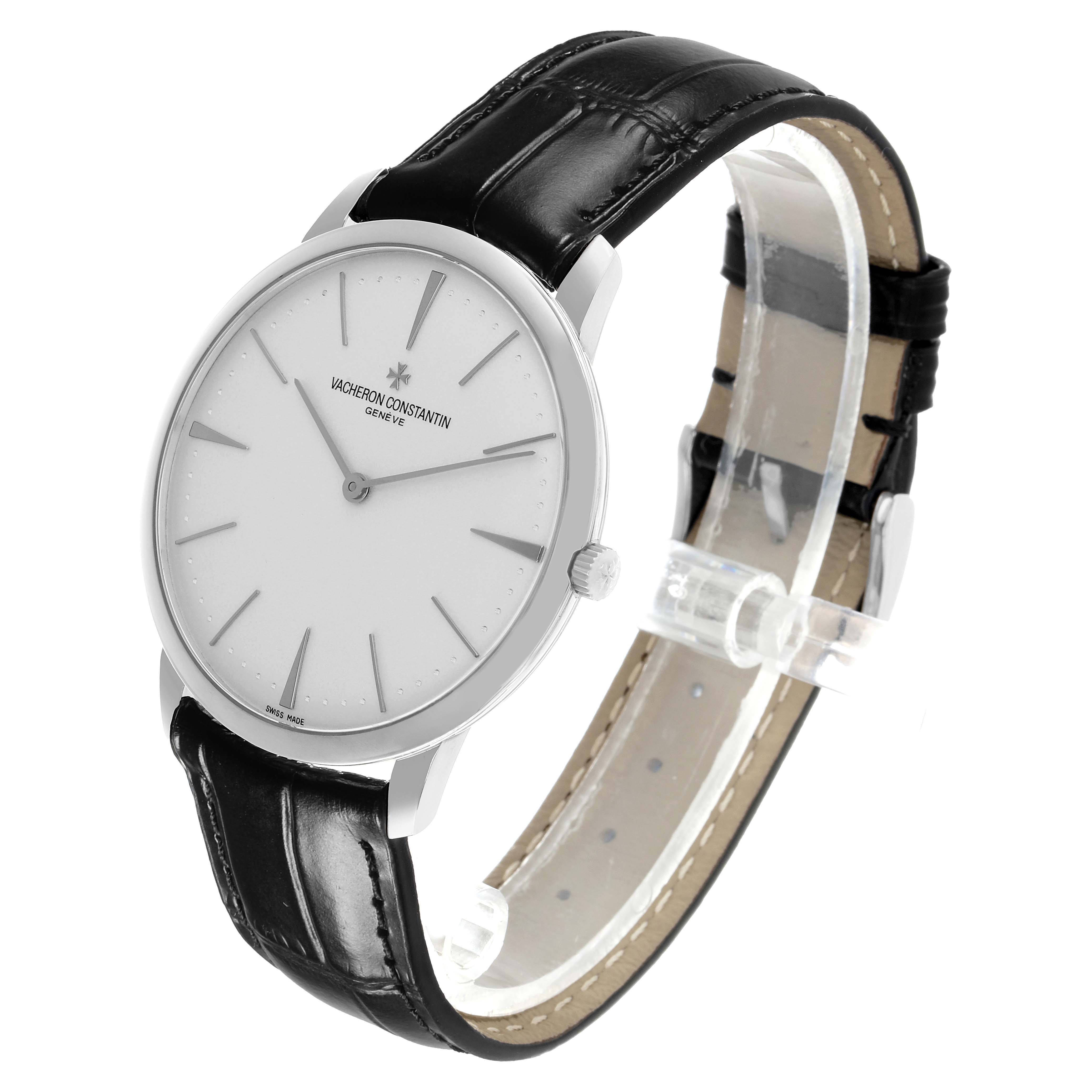 The Vacheron Constantin Patrimony 81180/000G Men's White Gold Silver Dial watch is shown at a three-quarter angle, highlighting the dial, bezel, and black leather strap.