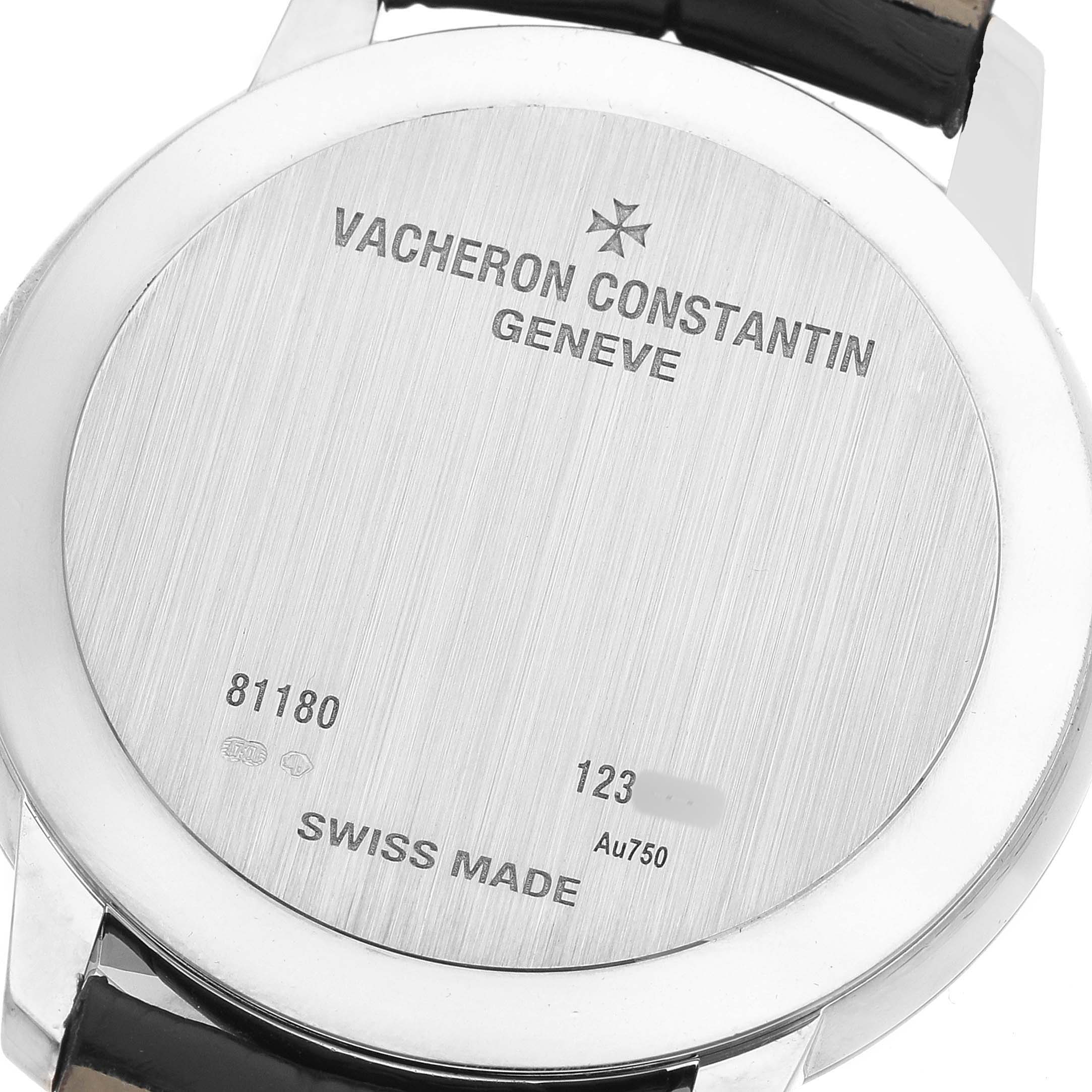 The image shows the case back of the Vacheron Constantin Patrimony 81180/000G Men's White Gold Silver Dial watch, highlighting engravings and hallmarks.
