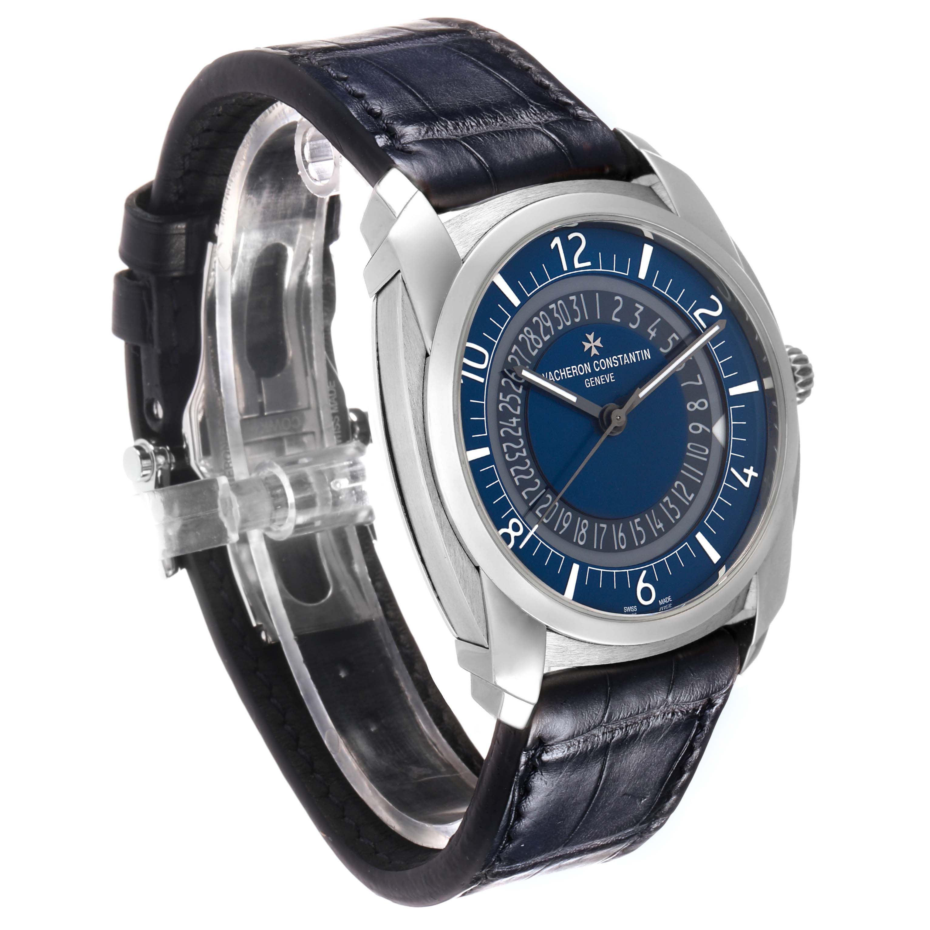 The Vacheron Constantin Quai de L'Ile watch is shown at a three-quarter angle, highlighting the blue dial, case, and leather strap.