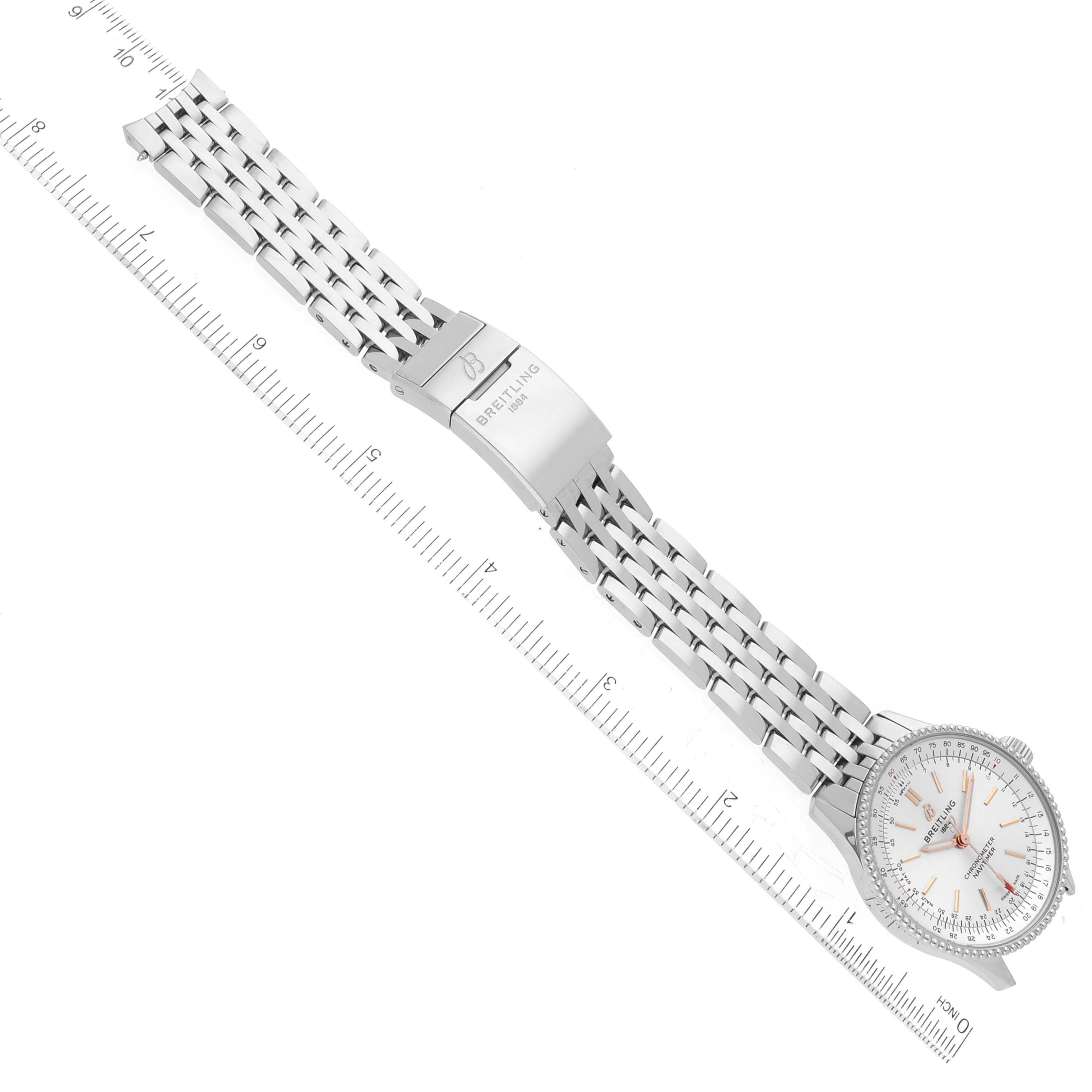 The image shows a top-down view of the Breitling A17395 Women's Stainless Steel Silver Dial A17395 Women's Stainless Steel Silver Dial Navitimer Automatic 35 model A17395 watch with a silver dial and steel bracelet.