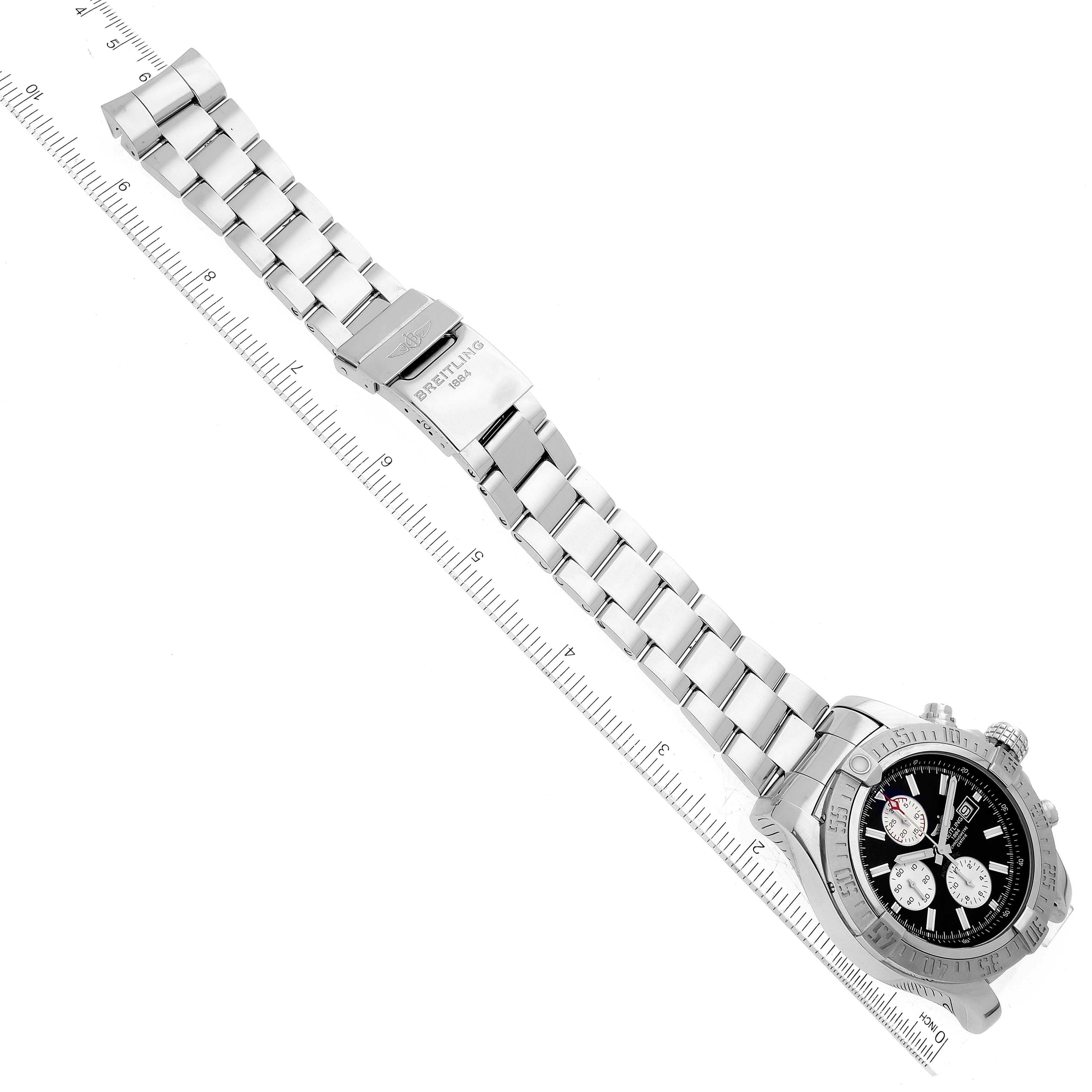 This image shows the Breitling Avenger A13371 Men's Stainless Steel Black Dial A13371 Men's Stainless Steel Black Dial watch from an overhead angle, highlighting the watch face and entire metal bracelet with clasp.