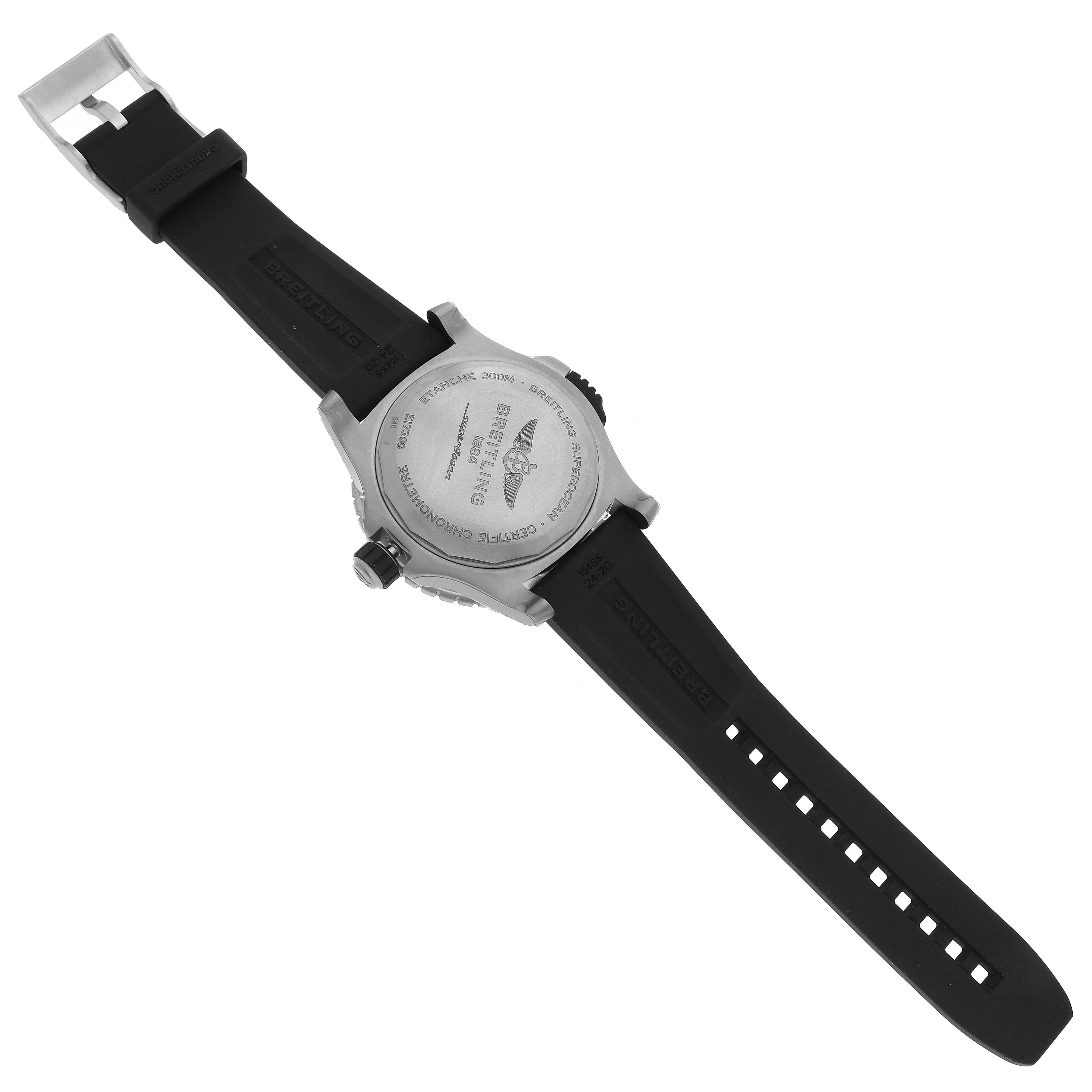The image shows the back view of a Superocean model watch by Breitling, displaying the case back and rubber strap.