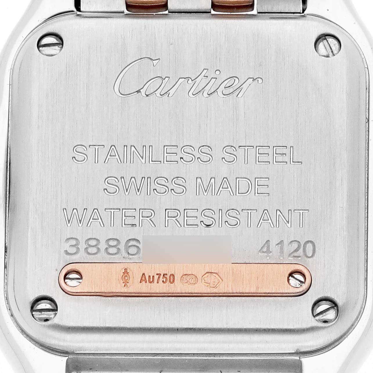 The image shows the back case of a Cartier Panthere W3PN0006 Women's Steel and Gold (two tone) Silver Dial W3PN0006 Women's Steel and Gold (two tone) Silver Dial watch, highlighting its stainless steel surface and engraved details.