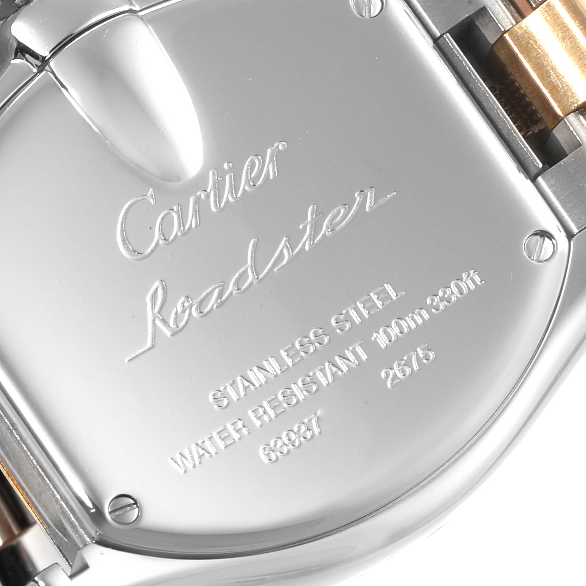 The image shows the back case of a Cartier Roadster W62026Y4 Women
s Steel and Gold (two tone) Silver Dial W62026Y4 Women
s Steel and Gold (two tone) Silver Dial watch, displaying engraving details and part of the band attachment.