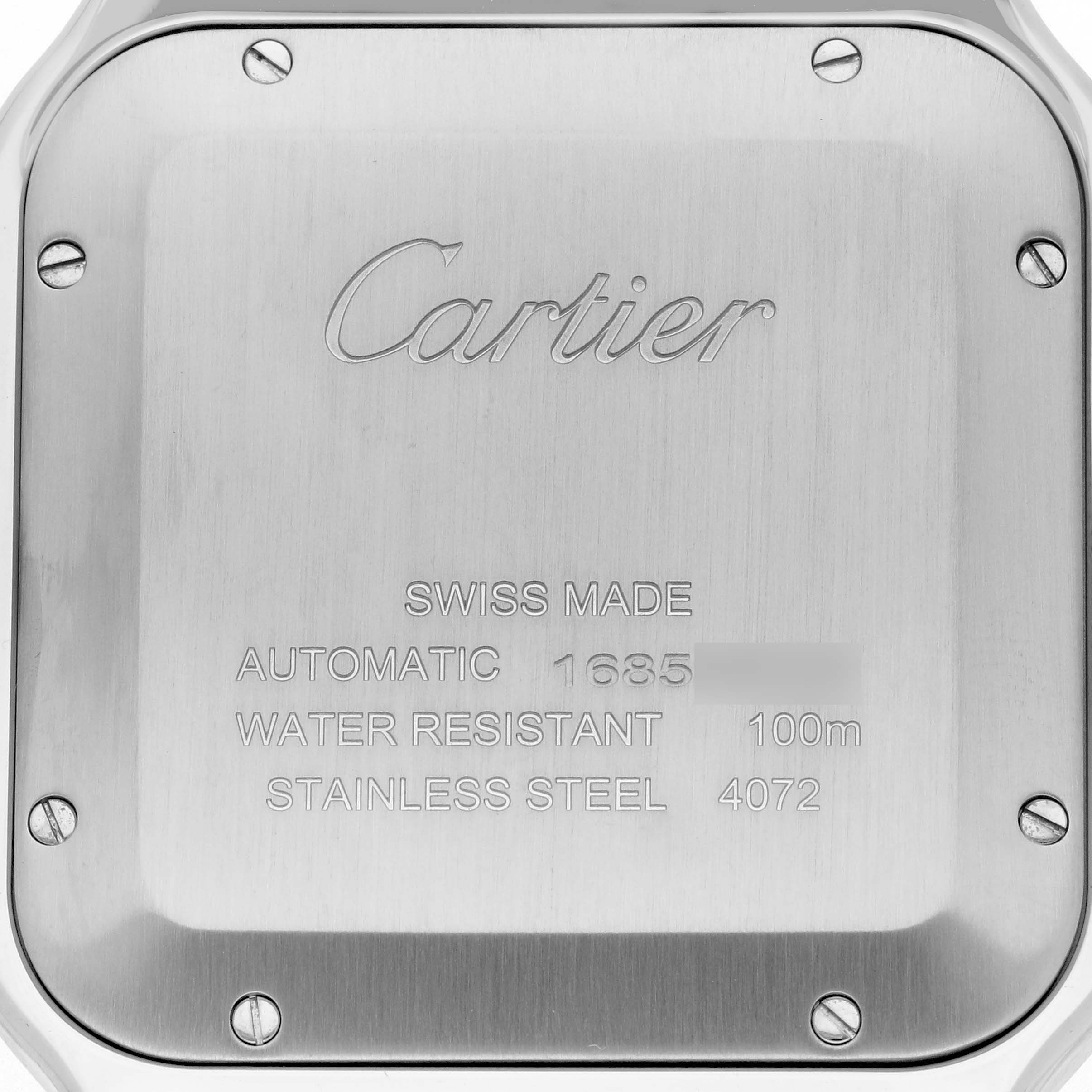 The image shows the case back of a Cartier Santos WSSA0048 Men's Stainless Steel Blue Dial WSSA0048 Men's Stainless Steel Blue Dial watch, featuring engraved details including "Swiss Made" and water resistance information.