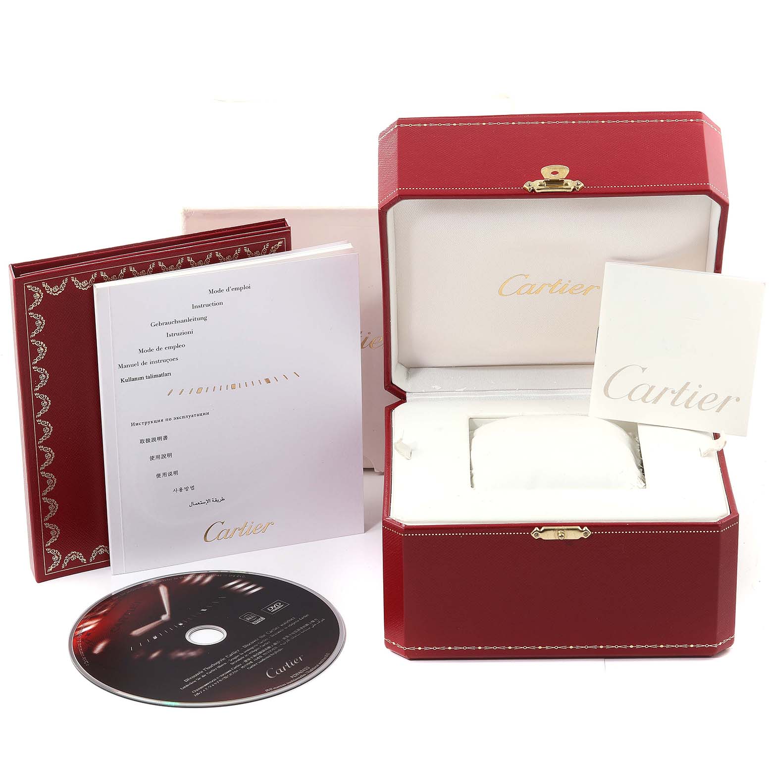 The image shows a Cartier Tank Francaise W2TA0003 Women's Steel and Gold (two tone) Silver Dial W2TA0003 Women's Steel and Gold (two tone) Silver Dial watch box, instruction booklet, and a CD, all photographed from an angled top view.