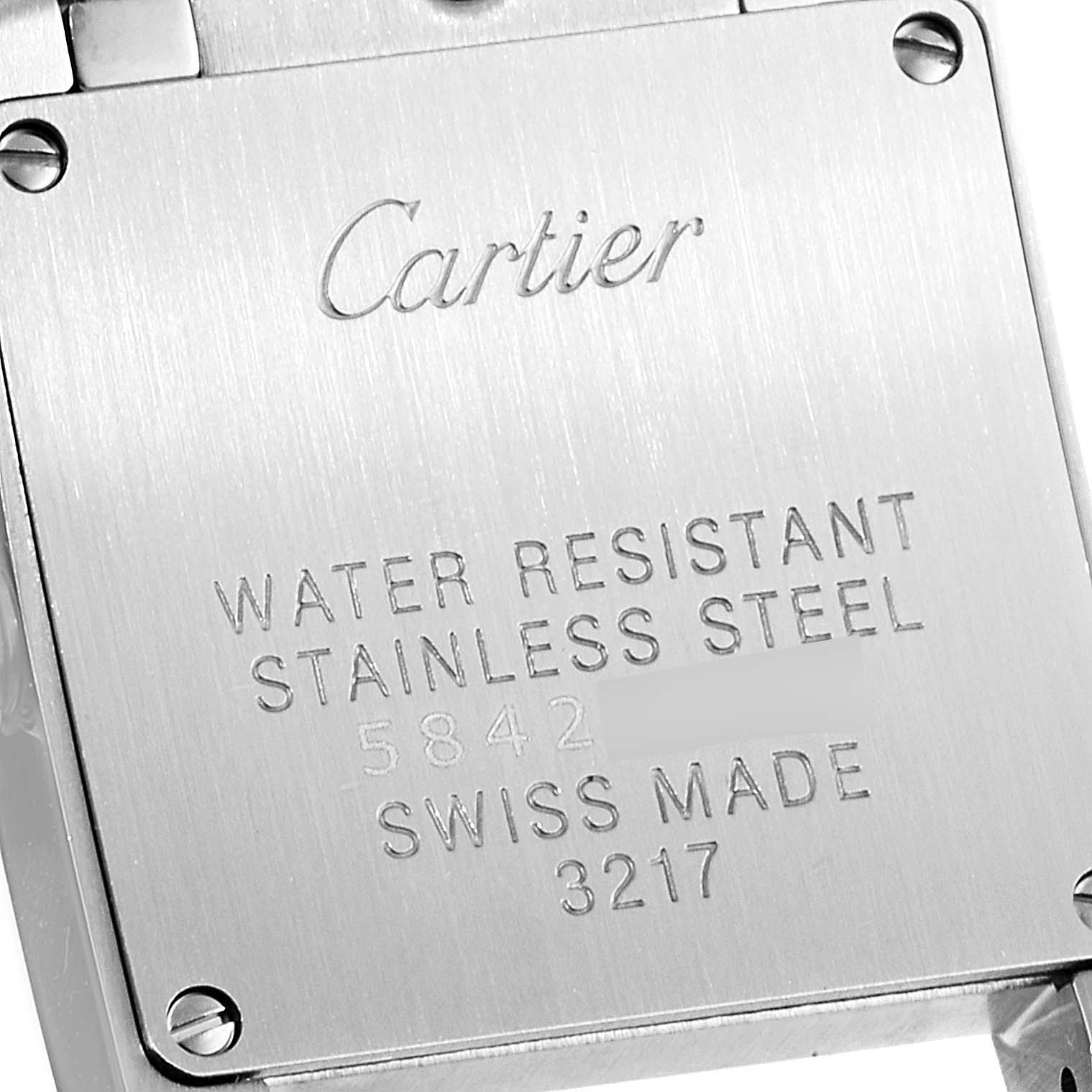 The image shows the back case of a Cartier Tank Française watch, highlighting its stainless steel material and water resistance.