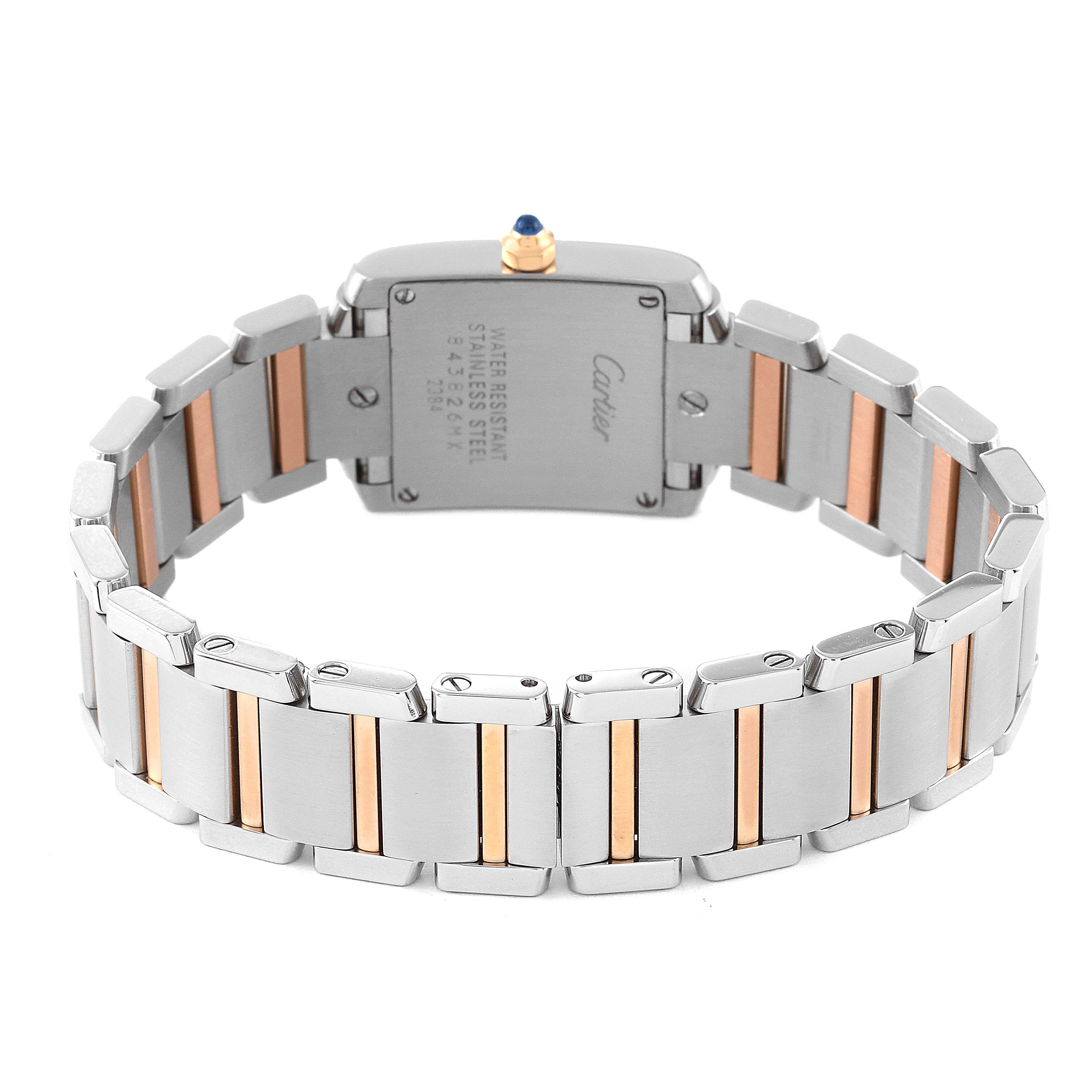 The image shows the back and bracelet of the Cartier Tank Francaise W51027Q4 Women's Steel and Gold (two tone) Mother of Pearl Dial W51027Q4 Women's Steel and Gold (two tone) Mother of Pearl Dial watch, featuring stainless steel and gold accents.